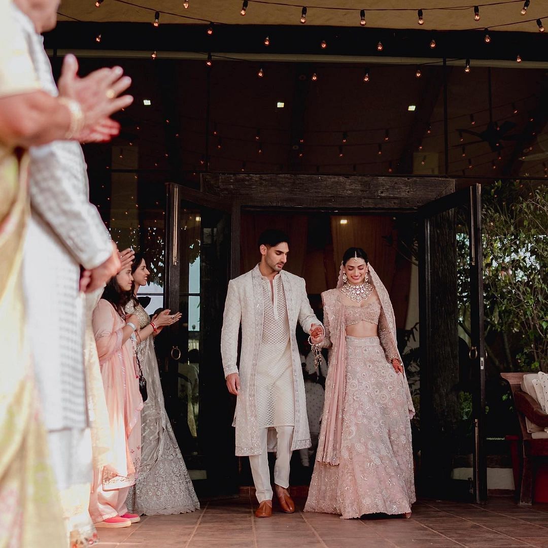 <div class="paragraphs"><p>Athiya walks hand-in-hand with her brother, Ahan Shetty.</p></div>