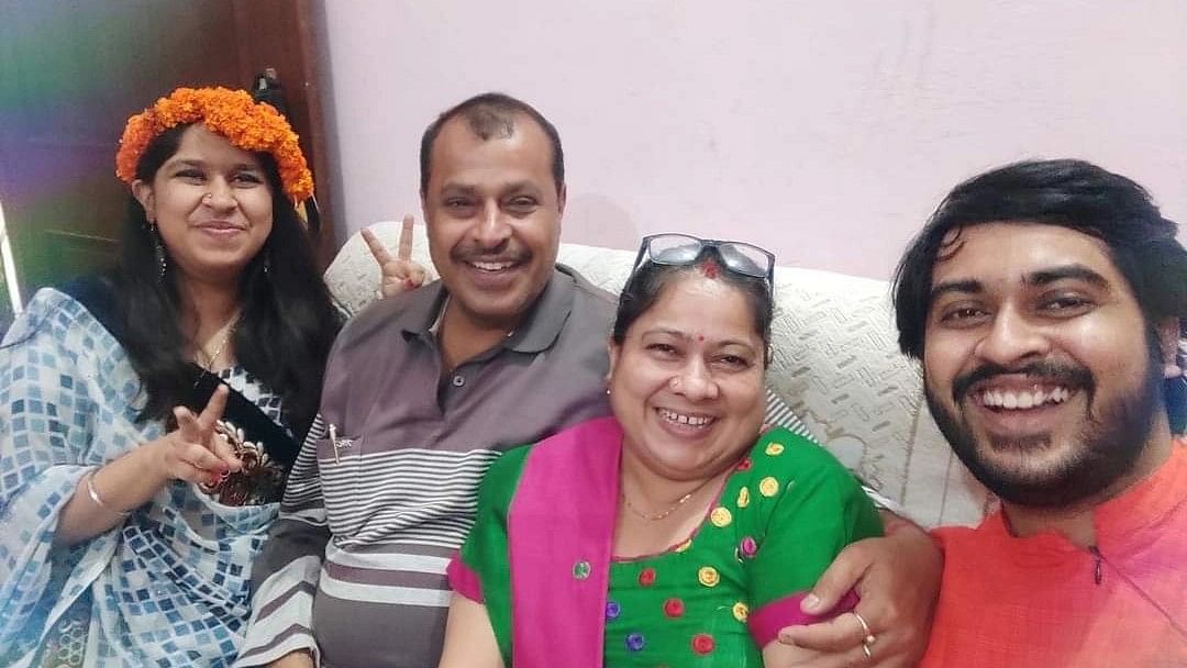 <div class="paragraphs"><p>Shivam Pandey (right) with his family.</p></div>