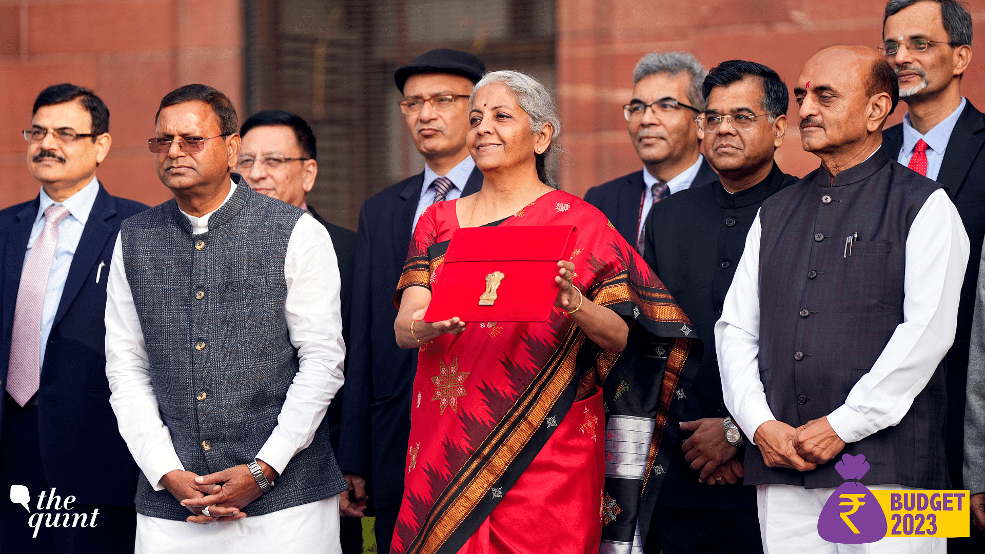 <div class="paragraphs"><p>Union Finance Minister Nirmala Sitharaman with Ministers of State Bhagwat Kishanrao Karad and Pankaj Chaudhary and officials poses for photographs outside the Finance Ministry at North Block, in New Delhi, Wednesday, Feb. 1, 2023, ahead of the presentation of the Union Budget 2023-24. </p></div>