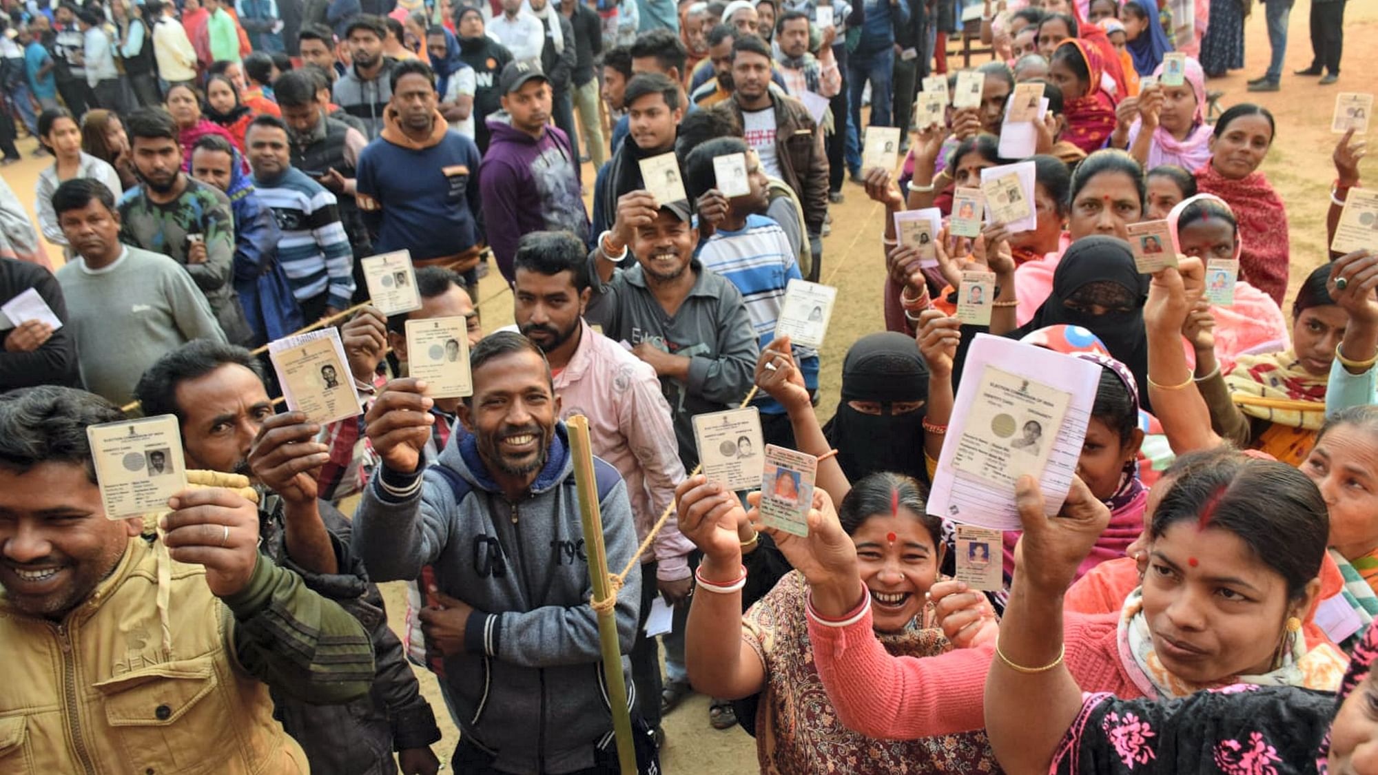 <div class="paragraphs"><p>Rajnagar: Voters show their identification cards as they wait in queues to cast their votes at a polling booth during the Tripura Assembly elections in Rajnagar on Thursday, 16 February.</p></div>
