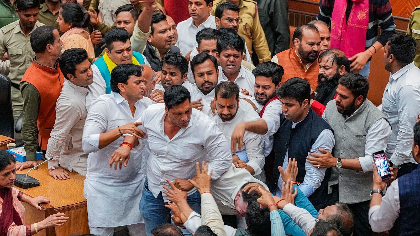 <div class="paragraphs"><p>In Photos: BJP-AAP Councillors 'Clash' at MCD House, Ruckus Ensues</p></div>