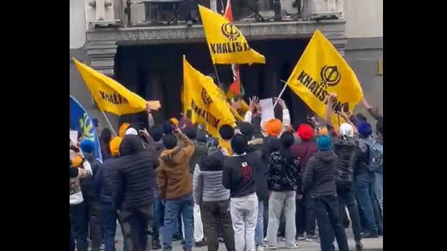 <div class="paragraphs"><p>Videos on social media purportedly showed a crowd waving "<a href="https://www.thequint.com/topic/khalistan-movement">Khalistan</a>" banners and a man removing the Indian flag from the balcony on the first floor of the building. The crowd was also heard chanting slogans in support of Khalistan.</p></div>