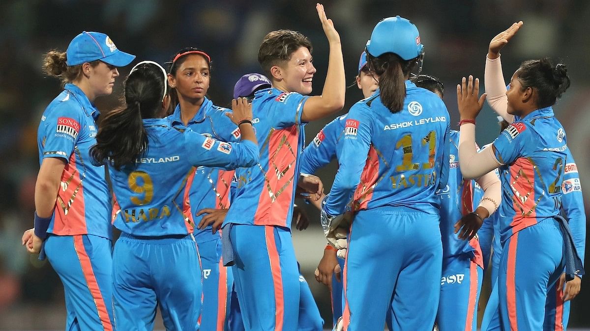 <div class="paragraphs"><p>WPL 2023: Mumbai Indians breezed past Delhi Capitals in an eight-wicket triumph.</p></div>