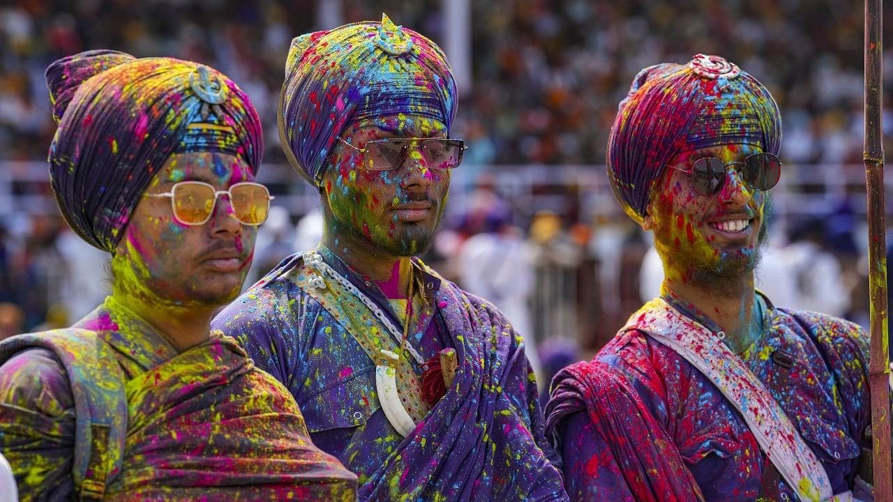 <div class="paragraphs"><p>Nihang Sikhs daubed in colours celebrate Hola Mohalla festival, in Anandpur Sahib.</p></div>