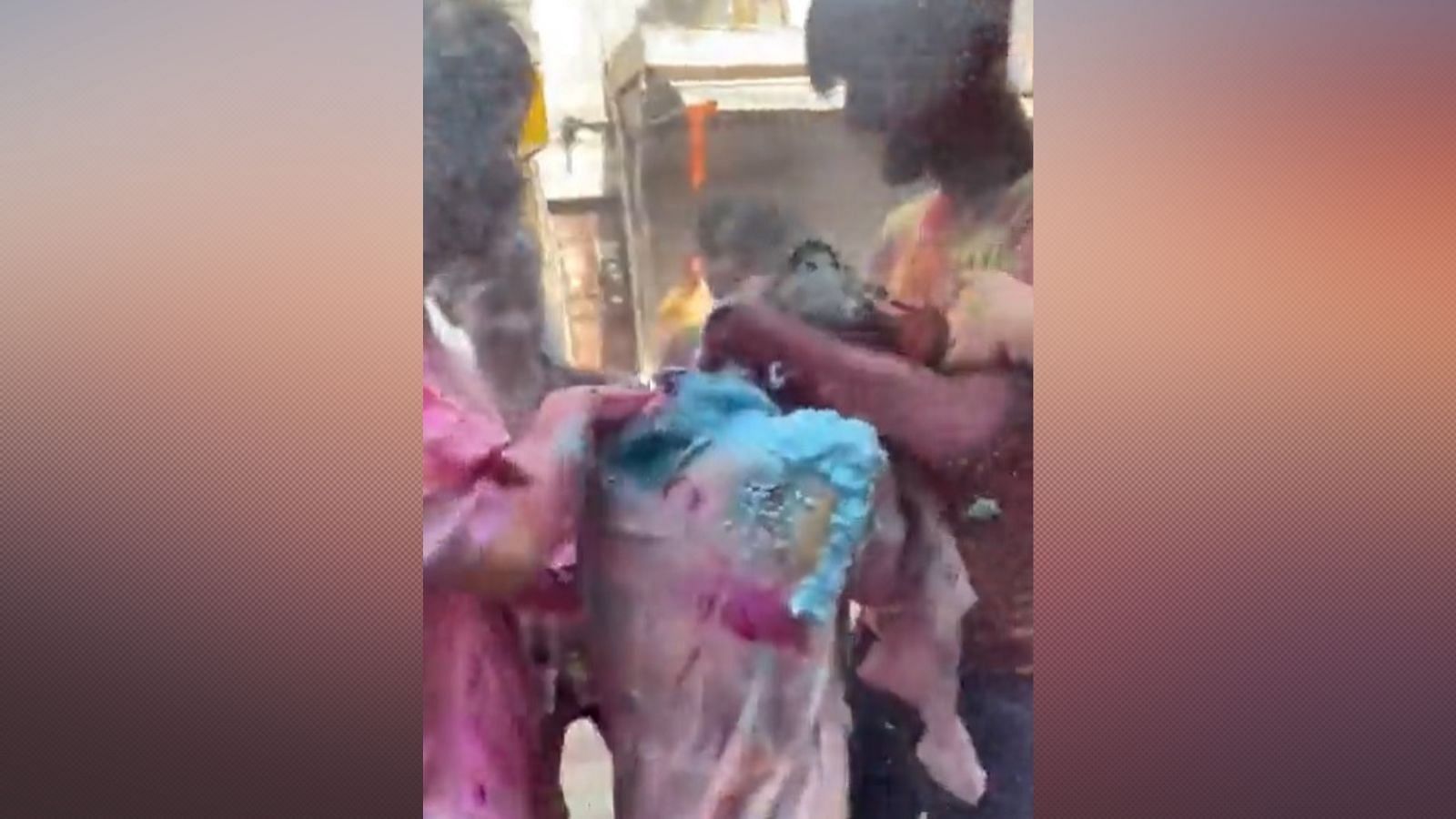 <div class="paragraphs"><p>The purported video being circulated on Twitter shows a group of at least 10 men – some teenagers – grabbing the woman by her neck, spraying colour on her, and even smashing an egg on her head.</p></div>