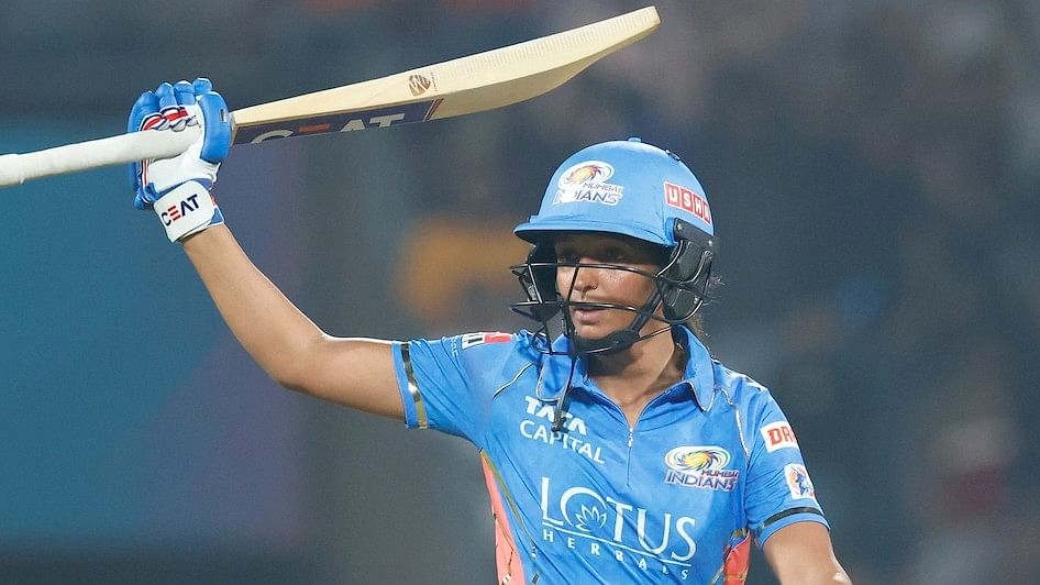 <div class="paragraphs"><p>Harmanpreet Kaur of Mumbai Indians raises his bat after scoring a fifty during match one of the Women’s Premier League between the Gujarat Giants and Mumbai Indians held at the Dr. DY Patil Sports Academy, Navi Mumbai on the 4th March 2023</p></div>