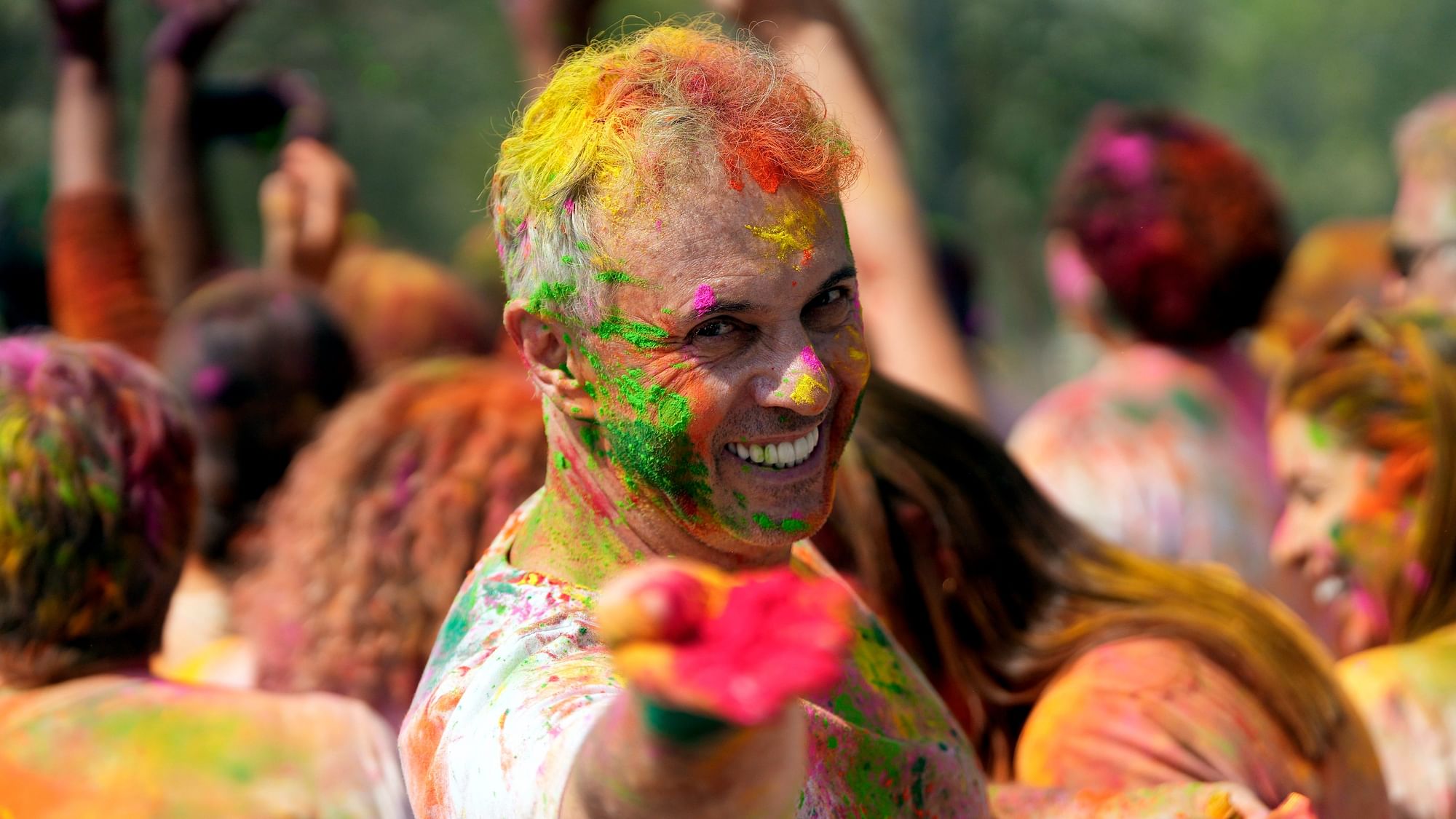 <div class="paragraphs"><p>People from Brazil celebrate Holi at India Gate in New Delhi on Wednesday, 8 March.</p></div>