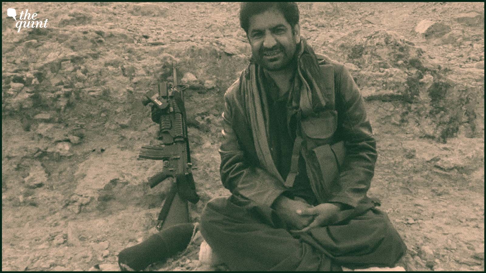 <div class="paragraphs"><p>A picture of&nbsp;Gulzar Imam with a machine gun.&nbsp;</p></div>