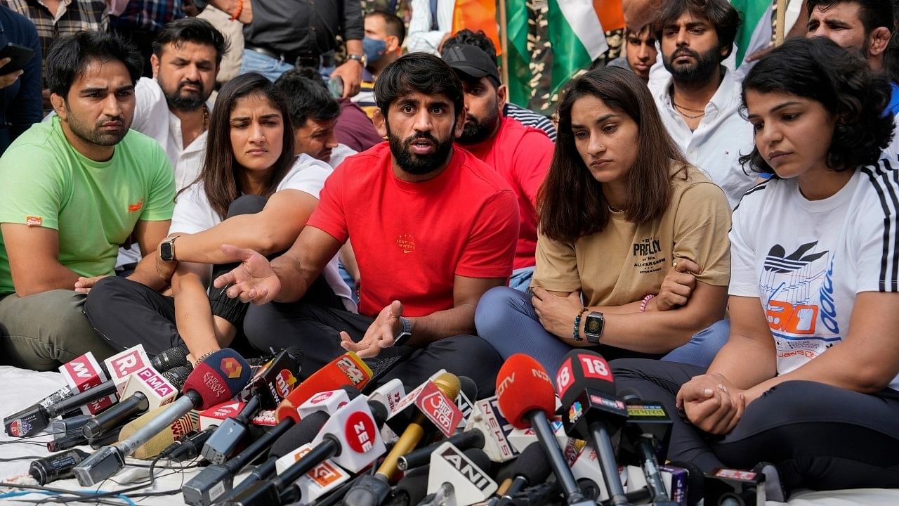 <div class="paragraphs"><p>Vinesh Phogat, Bajrang Punia and Sakshi Malik are among the wrestlers who protested against Brij Bhushan Sharan Singh.</p></div>