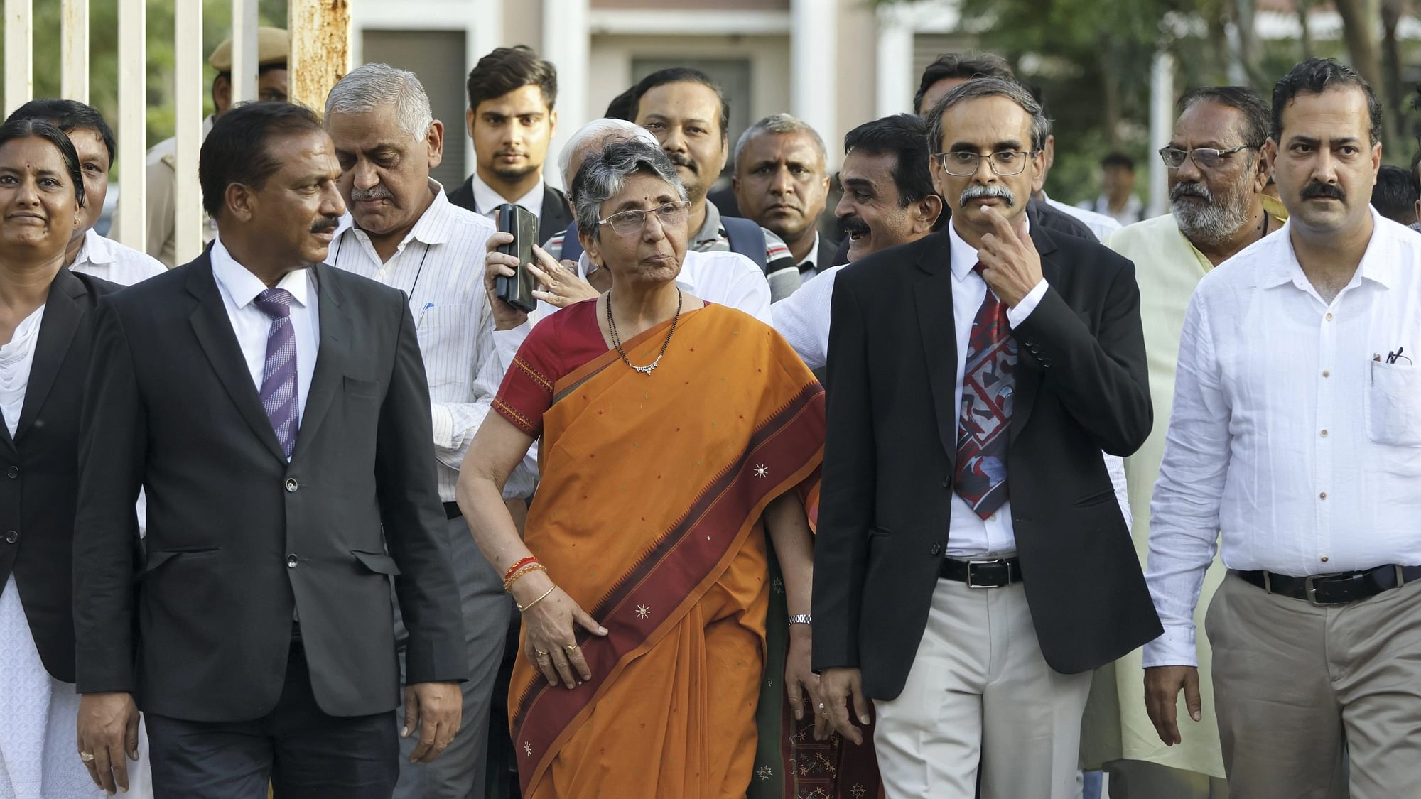 <div class="paragraphs"><p>Ex-BJP MLA Maya Kodnani along with advocates comes out of the Sessions Court after the verdict on Naroda Gam massacre case.&nbsp;</p></div>
