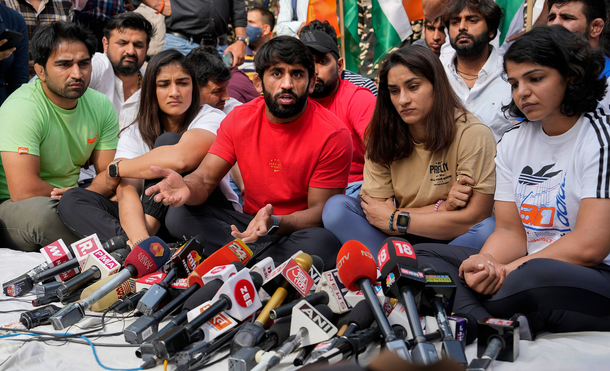 <div class="paragraphs"><p>Wrestlers Bajrang Punia, Vinesh Phogat, Sakshi Malik and others addressing the press during their protest in Delhi's Jantar Mantar.&nbsp;</p></div>