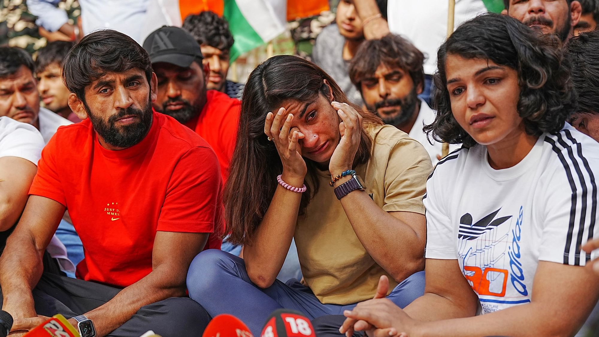 <div class="paragraphs"><p>Vinesh Phogat, Bajrang Punia and Sakshi Malik are among the wrestlers who have returned to protest against Brij Bhushan Sharan Singh.</p></div>
