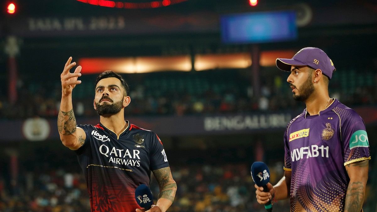 <div class="paragraphs"><p>Virat Kohli of Royal Challengers Bangalore flipping the toss coin and Nitish Rana of Kolkata Knight Riders call for it during match 36 of the Tata Indian Premier League 2023 between the Royal Challengers Bangalore and the Kolkata Knight Riders</p></div>