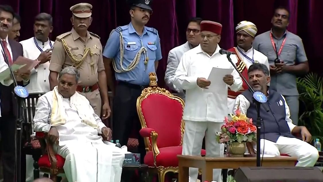 <div class="paragraphs"><p>Karnataka Chief Minister Siddaramaiah, his deputy DK Shivakumar, and Governor Thawarchand Gehlot at the oath-taking ceremony.</p></div>