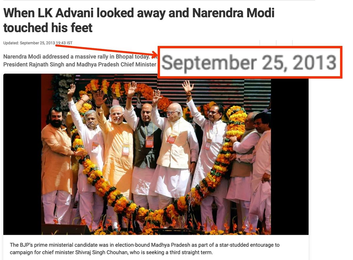 The photo is edited. The original one shows PM Modi bending to touch veteran politician LK Advani's feet.