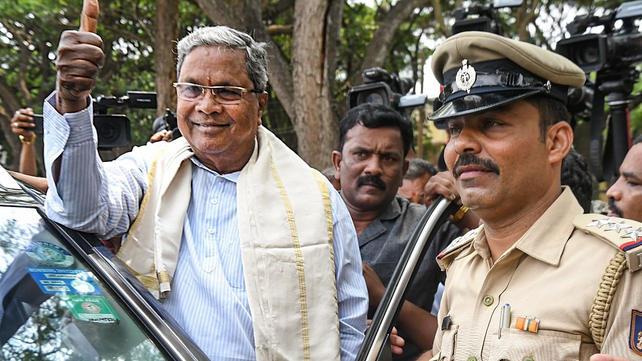 <div class="paragraphs"><p> Congress leader Siddaramaiah reacts as the party leads in the Karnataka Assembly polls as per the early trends.</p></div>
