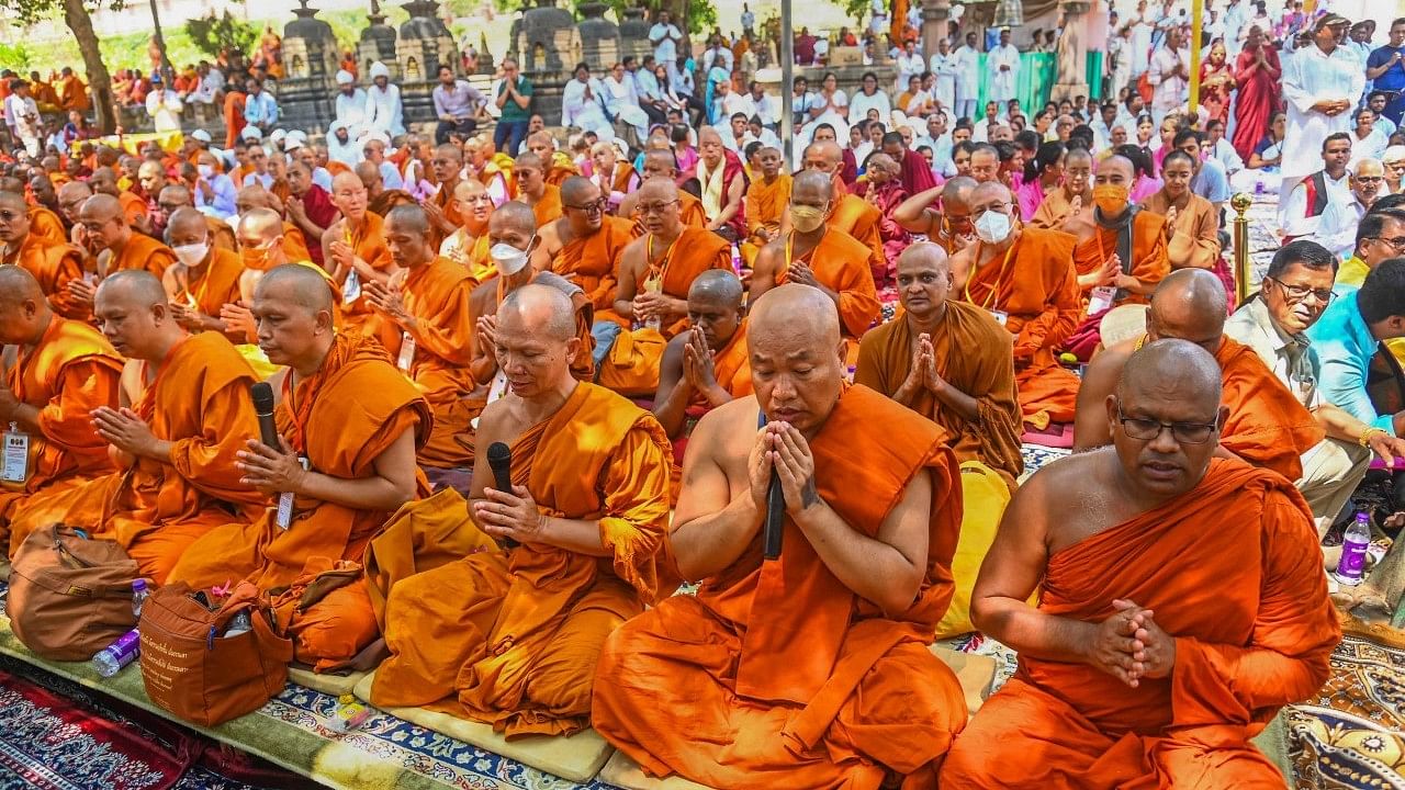 <div class="paragraphs"><p>Bodh Gaya: Buddhist devotees offer prayers at Mahabodhi temple on the occasion of Buddha Purnima on Friday, 5 May.</p></div>