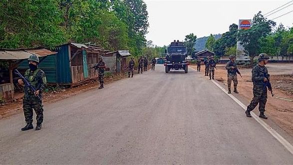 <div class="paragraphs"><p>Army and Assam Rifles personnel conduct a flag march in violence-hit areas amid tribal groups protest over court order on Scheduled Tribe status, Manipur.</p></div>