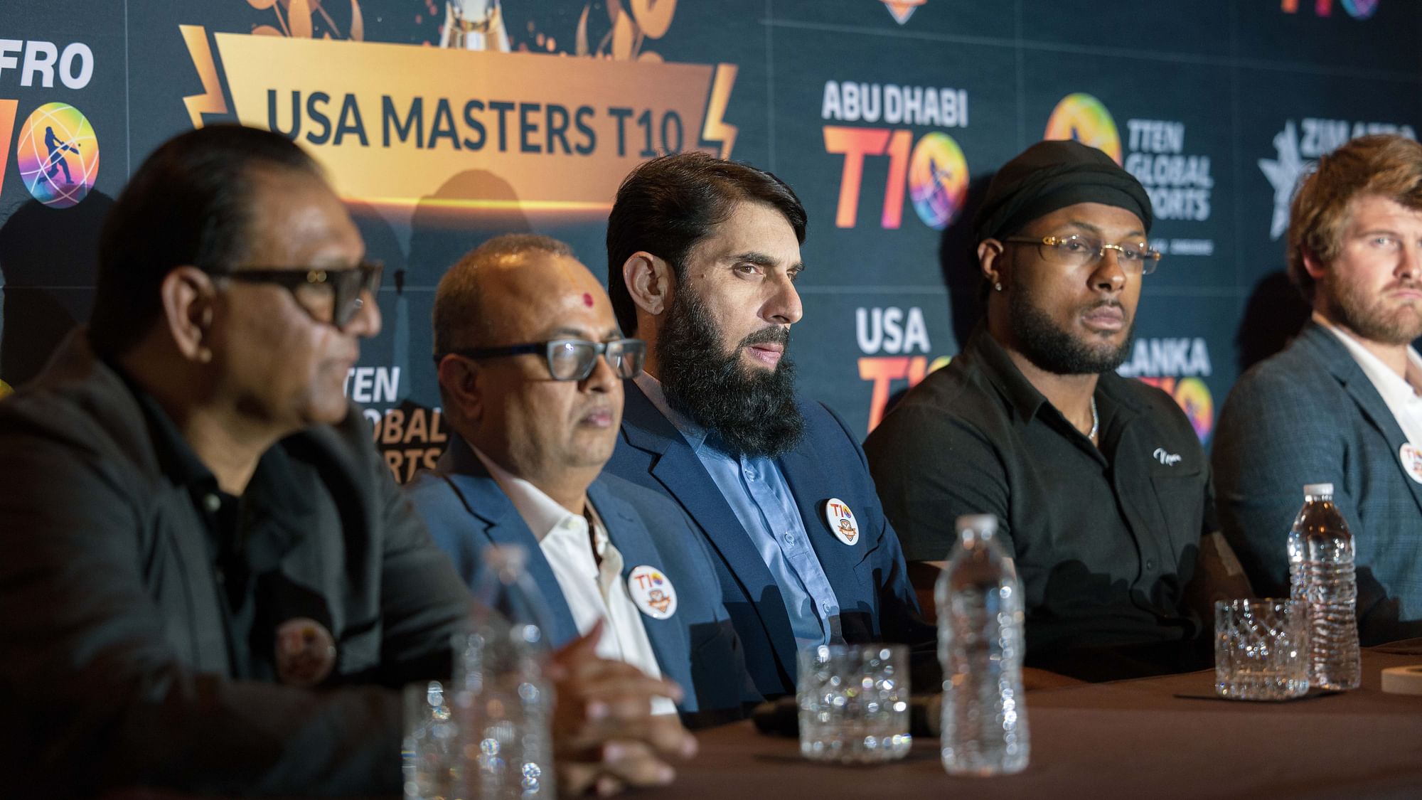 <div class="paragraphs"><p>Misbah Ul Haq and Corey Anderson at the press conference in Dallas.&nbsp;</p></div>
