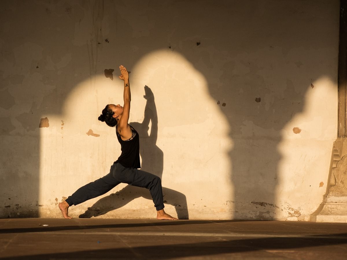 <div class="paragraphs"><p>Girl performing&nbsp;Surya Namaskar</p></div>