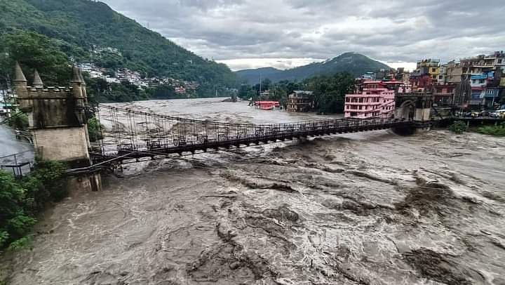 The mighty River Beas has destroyed the bridge connecting the Shiv Temple, and houses have been washed away.