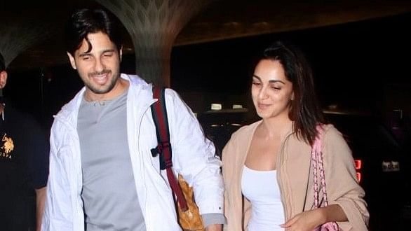 Pics: Kiara Advani-Sidharth Malhotra Hold Hands as They Leave for Her B'Day Trip