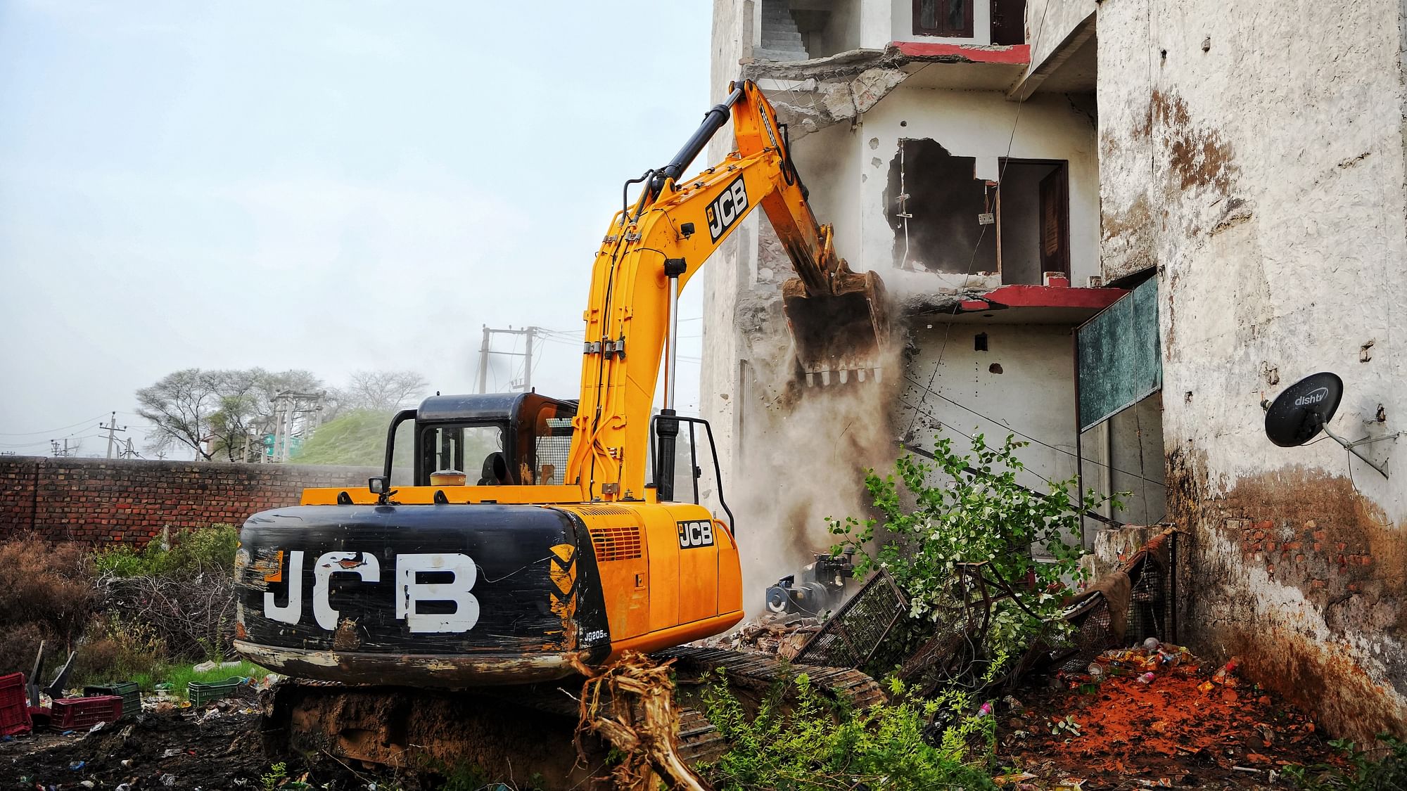 <div class="paragraphs"><p>A bulldozer demolishes a Muslim-owned hotel/restaurant in Haryana’s Nuh on 6 August 2023. The police alleged it was used to pelt stones during communal clashes in the district on 31 July.</p></div>