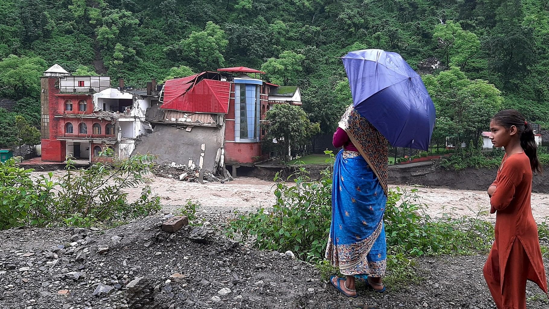 <div class="paragraphs"><p>The Doon Defense College building collapses near Dehradun due to the incessant rains, near Dehradun,&nbsp;on Monday, 14 August.</p></div>