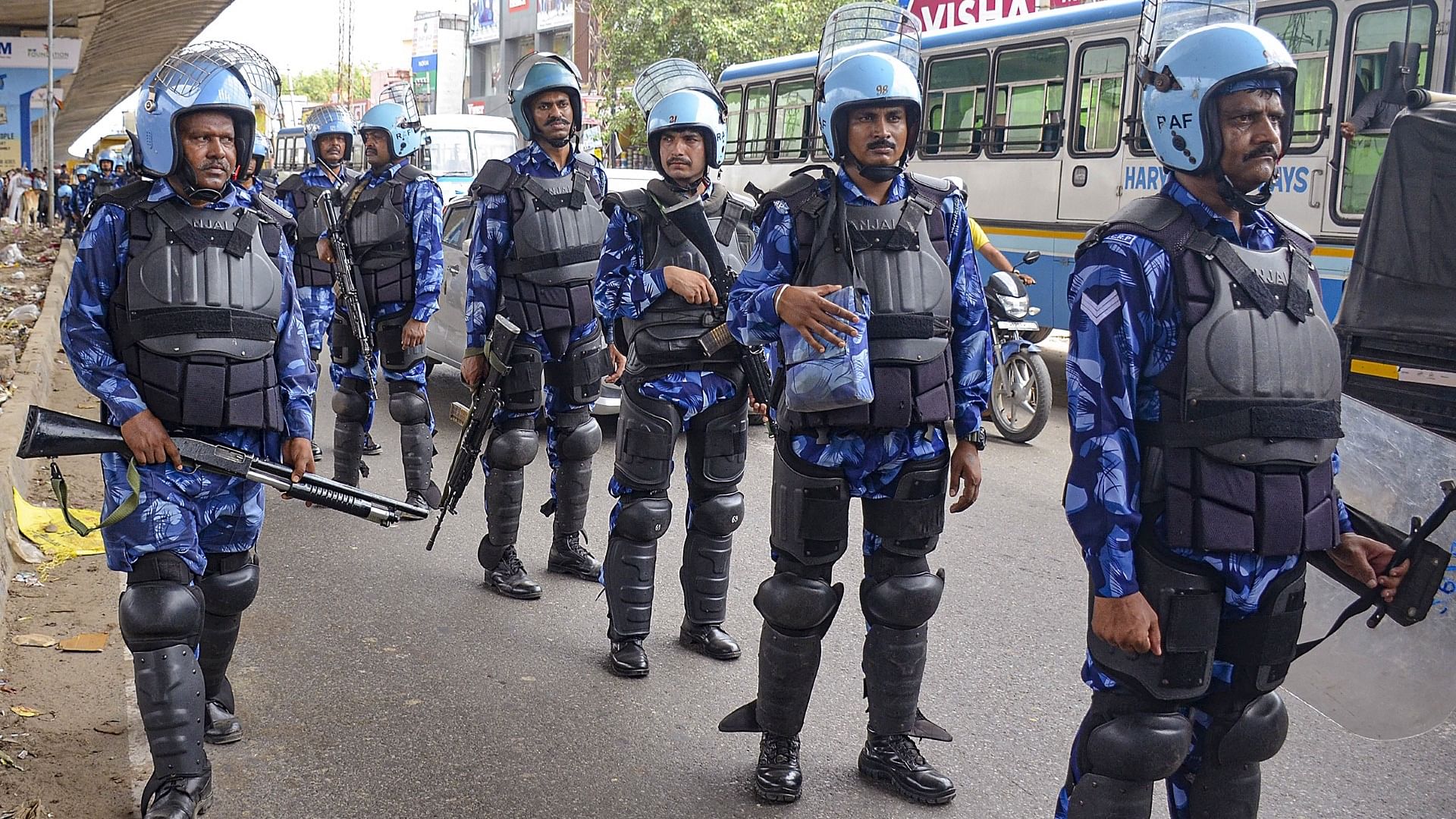 <div class="paragraphs"><p>Gurugram: Rapid Action Force (RAF) personnel conduct a flag march at Badshahpur after incidents of violence following Mondays attack on a procession in adjoining Nuh district</p></div>