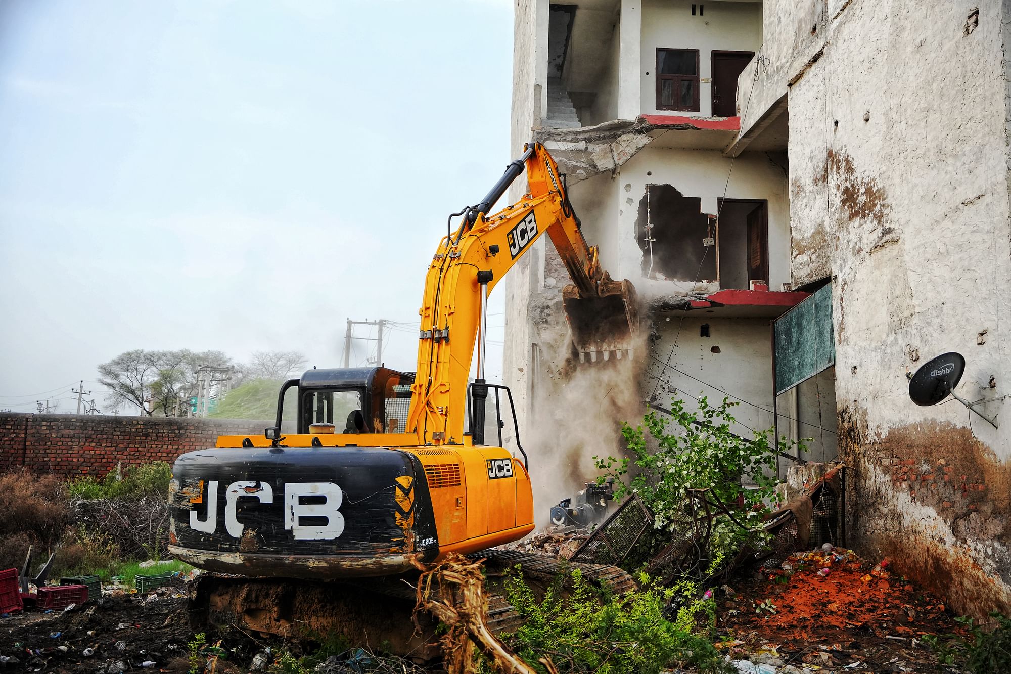 <div class="paragraphs"><p>A bulldozer demolishes a Muslim-owned hotel/restaurant in Haryana’s Nuh on 6 August 2023. The police alleged it was used to pelt stones during communal clashes in the district on 31 July.</p></div>