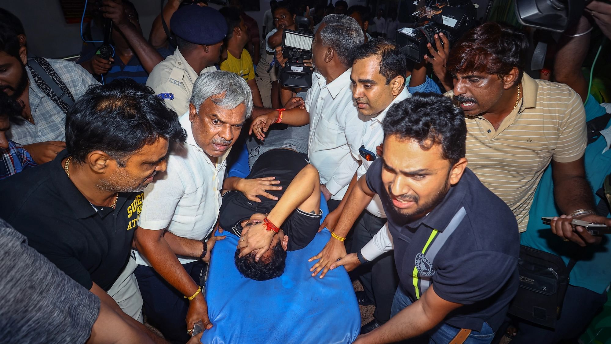<div class="paragraphs"><p>Tamil Nadu Electricity Minister V Senthil Balaji reacts in pain while being taken to a government hospital after his arrest in connection with a money laundering case, in Chennai, Tuesday night, June 13, 2023. Balaji was taken to the hospital after he complained of chest pain. </p></div>
