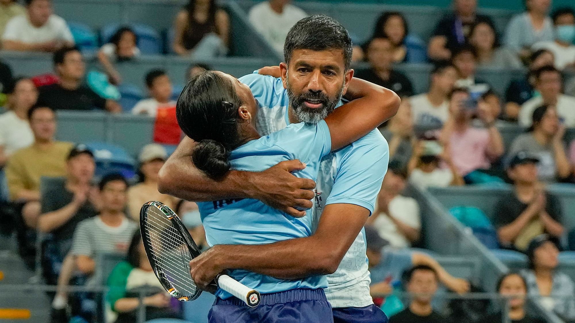 <div class="paragraphs"><p>Asian Games: The Indian pair of Rohan Bopanna and Rutuja Bhosale defeated the Chinese Taipei duo in the mixed doubles event to win a gold medal</p></div>