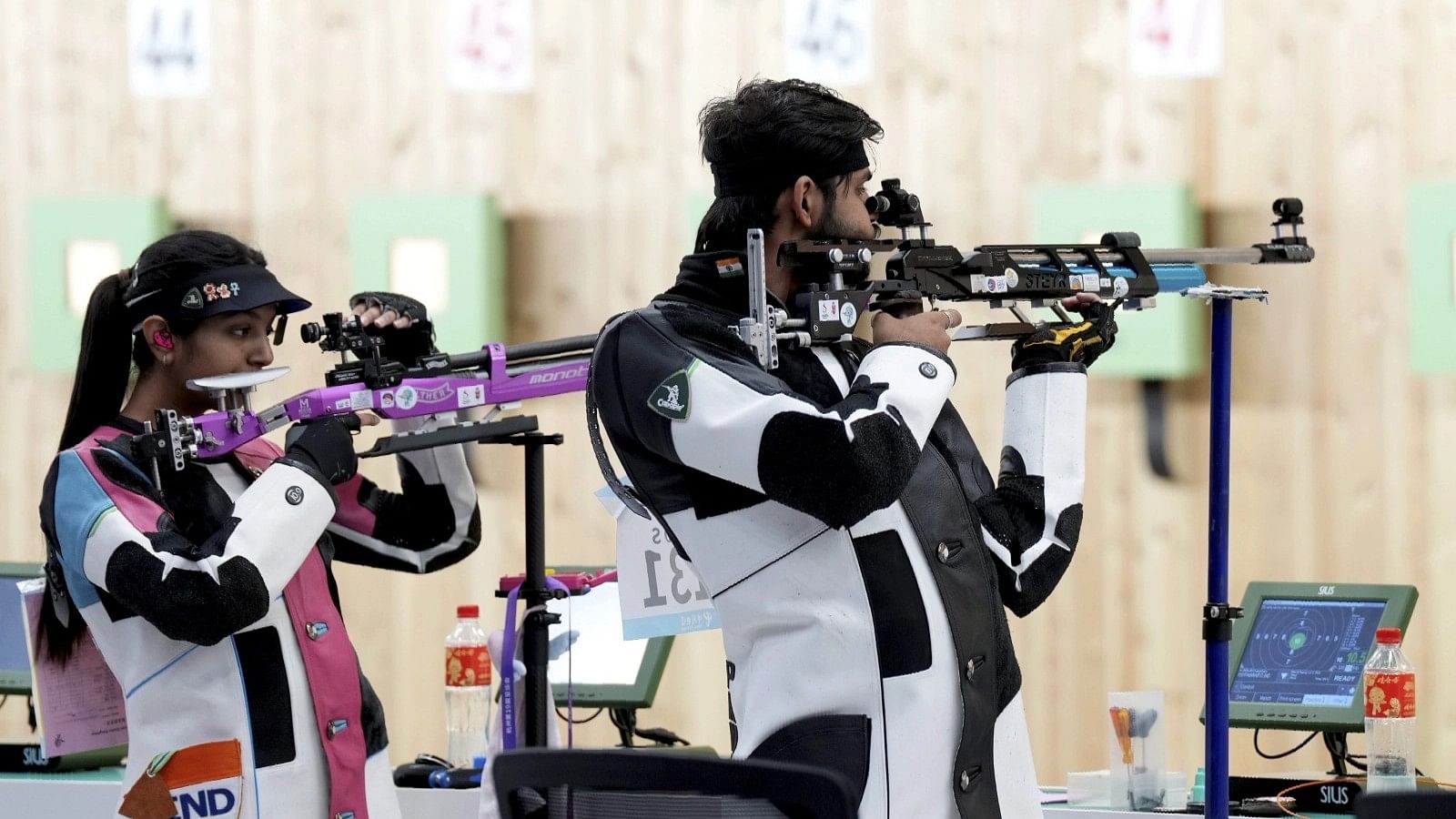 <div class="paragraphs"><p>Divyansh Singh Panwar and Ramita during the bronze medal match of the 10m Air Rifle Mixed Team event at the 2023 Asian Games.</p></div>