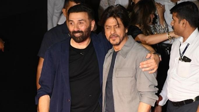 <div class="paragraphs"><p>Shah Rukh Khan and Sunny Deol at <em>Gadar 2</em> success party.</p></div>