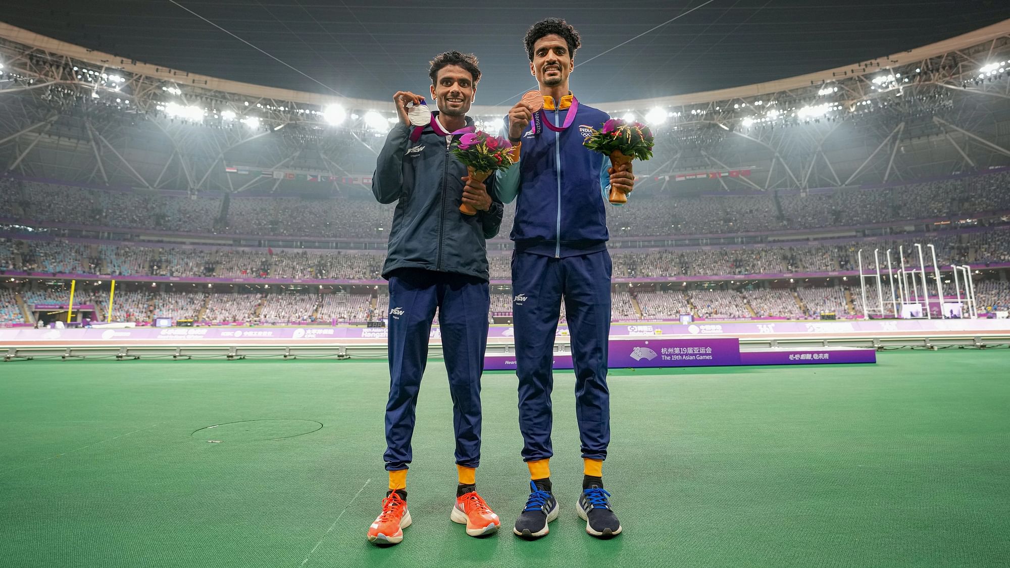 <div class="paragraphs"><p>2023 Asian Games: Karthik &amp; Gulveer Claim Silver and Bronze in Men’s 10,000m</p></div>