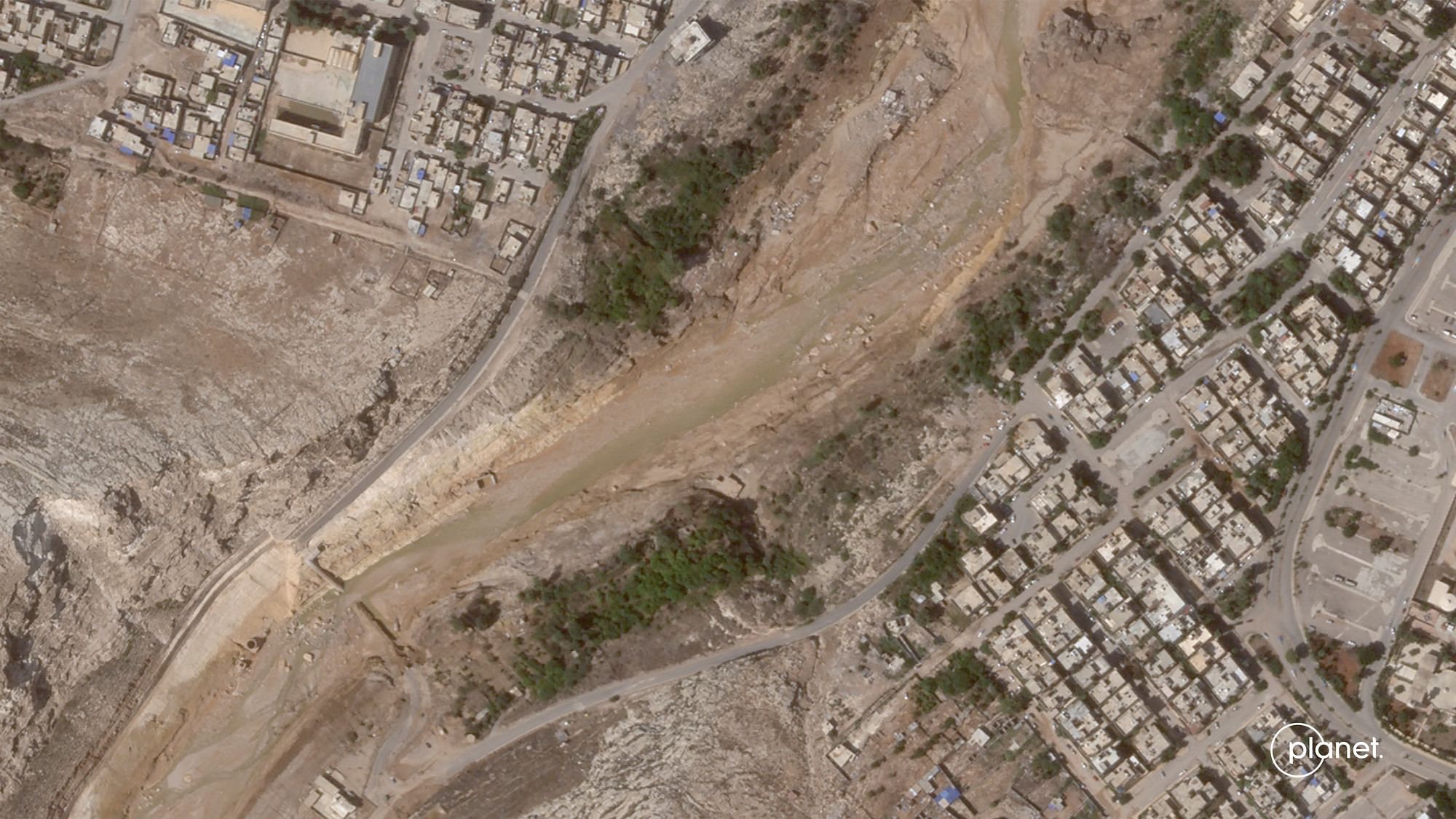 <div class="paragraphs"><p>This satellite photo from Planet Labs PBC shows a dam collapse in Derna, Libya, on Tuesday, 12 September. The destruction came to Derna and other parts of eastern Libya on Sunday night, 10 September.  </p></div>