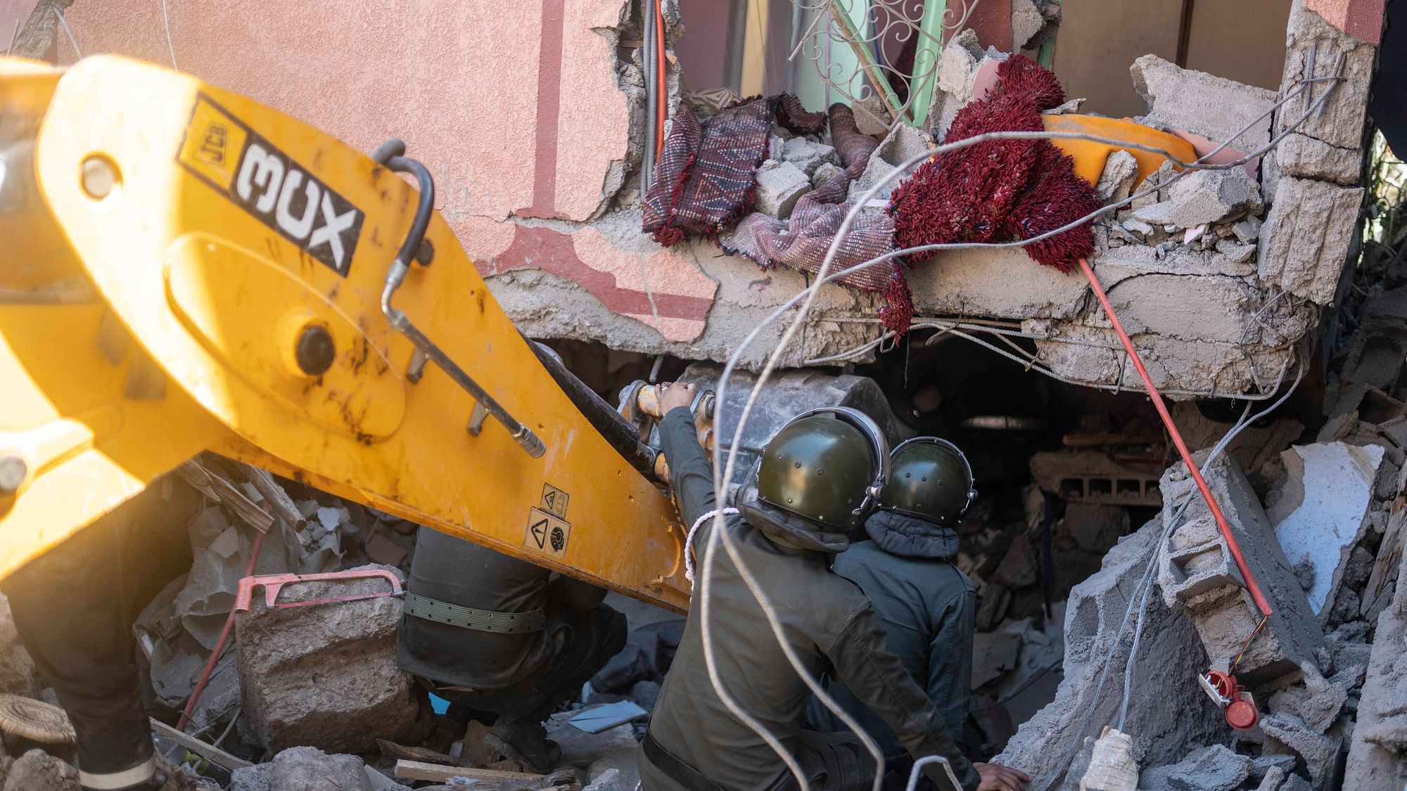 <div class="paragraphs"><p>Security forces take part in a rescue operation after an earthquake, in Moulay Ibrahim village, near Marrakech, Morocco, on Saturday, 9 September.&nbsp;</p></div>