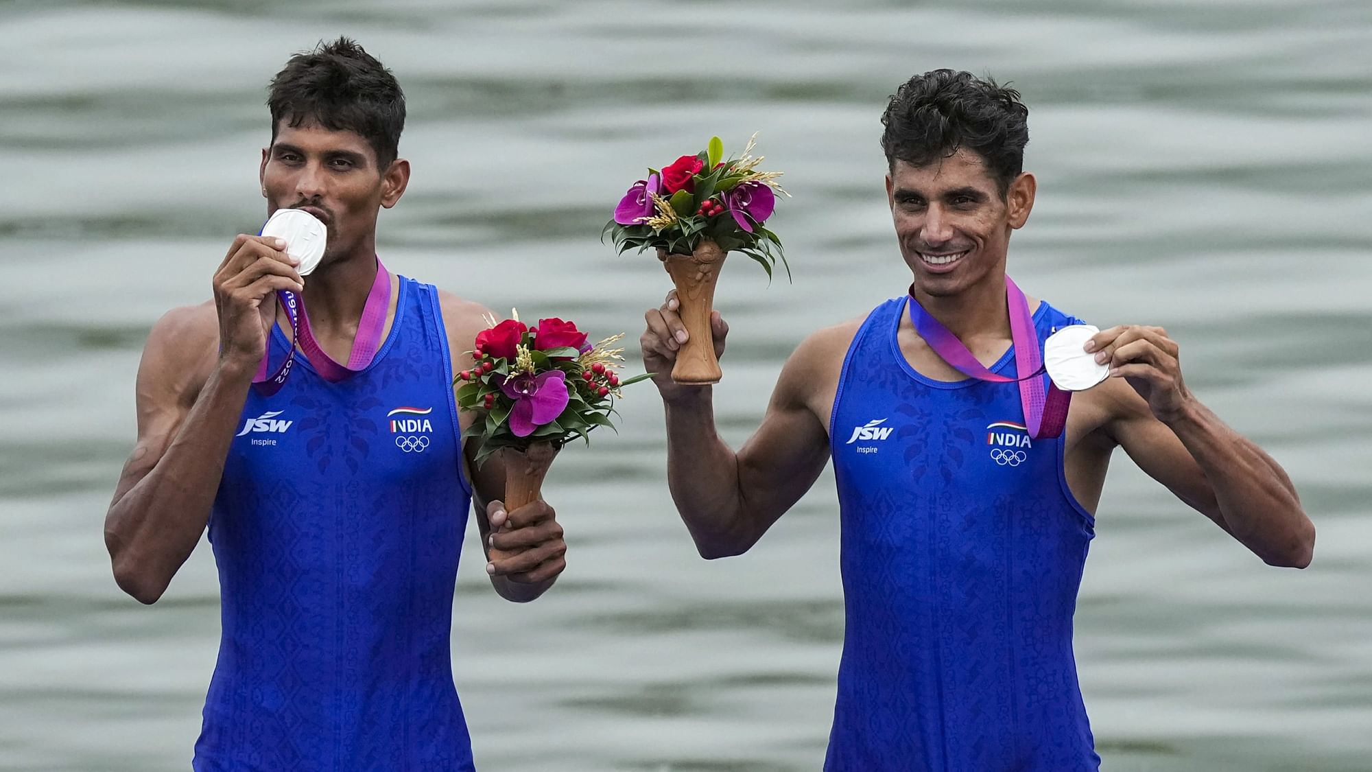 <div class="paragraphs"><p>Rowers Arjun Lal Jat and Arvind Singh with their silver medal at the 2023 Asian Games.</p></div>