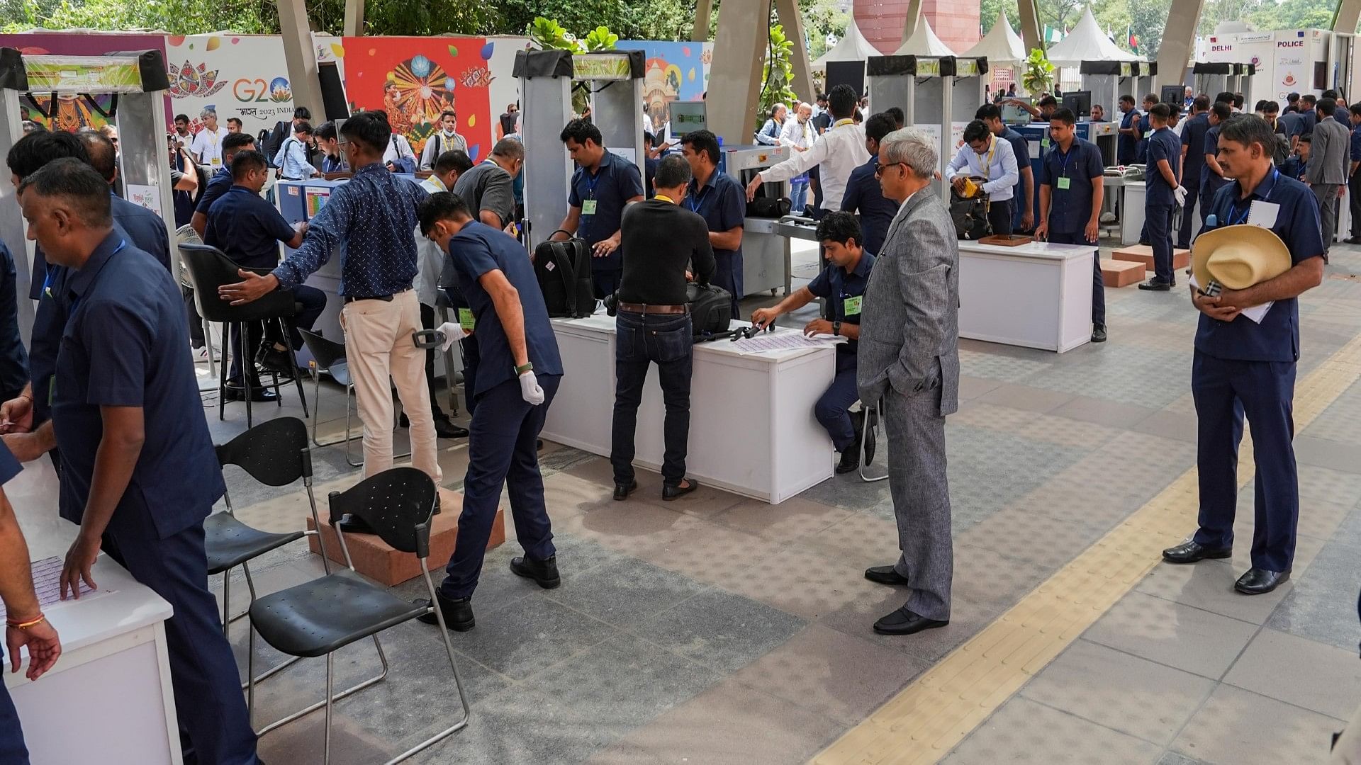 <div class="paragraphs"><p>Media personnel undergo a security check before the Pre-Summit press briefing by the G20 presidency ahead of the G20 Summit.</p></div>