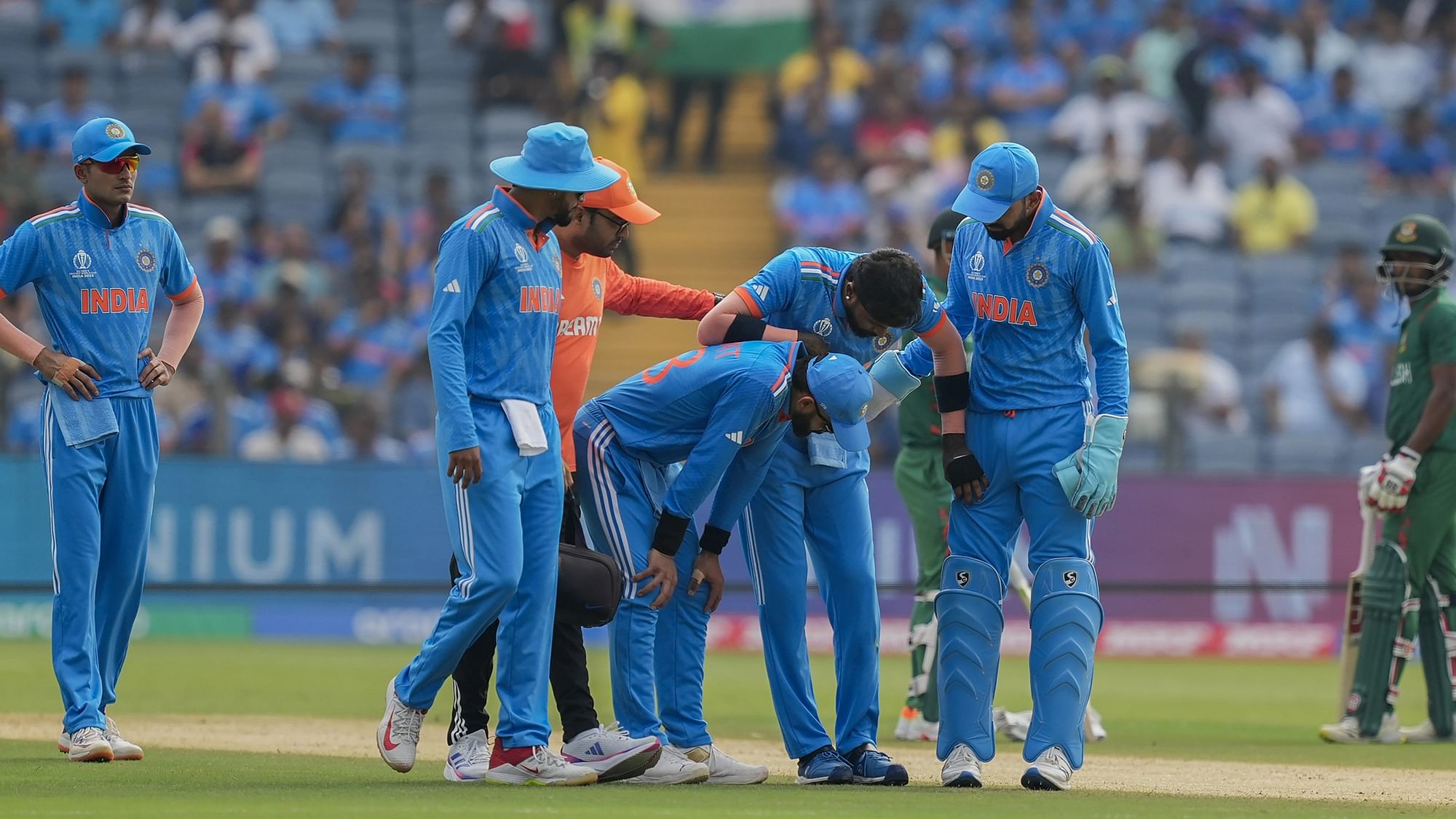 <div class="paragraphs"><p>Pune: India's Hardik Pandya is helped by teammates after&nbsp;he suffered an injury during the ICC Men's Cricket World Cup 2023 match between India and Bangladesh, at Maharashtra Cricket Association Stadium in Pune, Thursday, Oct. 19, 2023. </p></div>