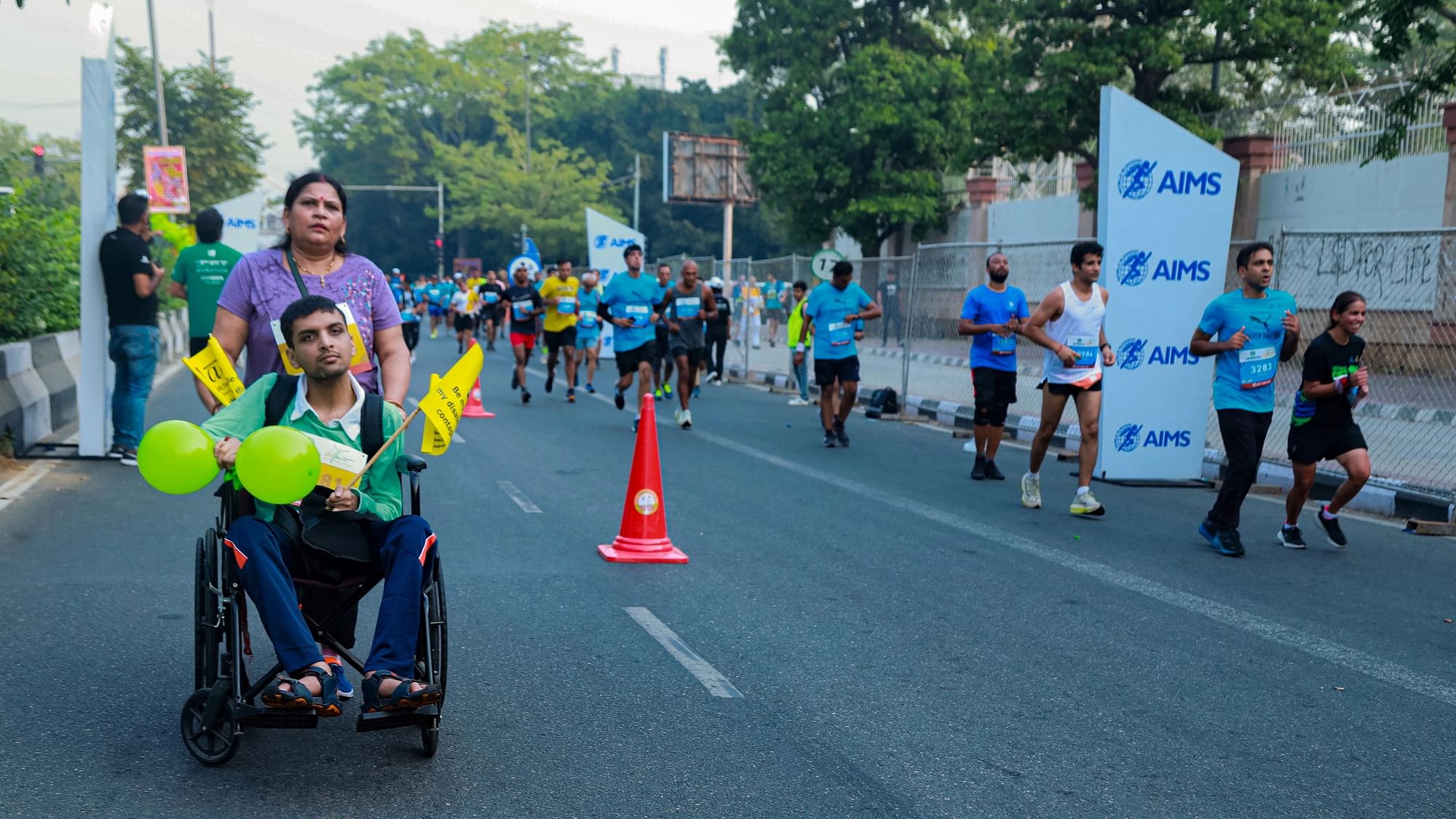 <div class="paragraphs"><p>Shubham Kumar Mishra with his mother Sangita Mishra.&nbsp;</p><p>Shubham (25), who has Cerebral Palsy, has been participating in Delhi Half Marathon for five years now.&nbsp;</p></div>