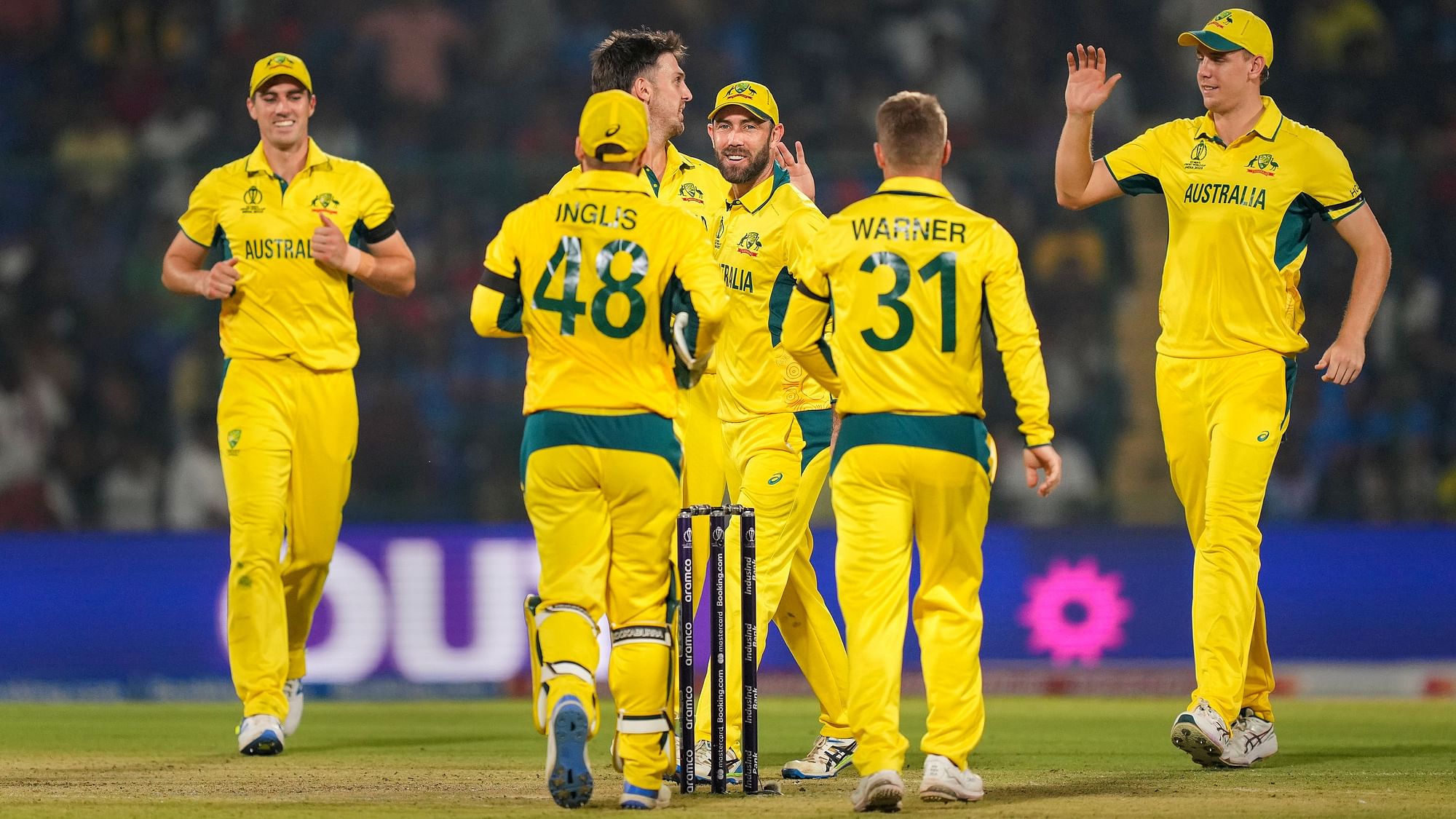 <div class="paragraphs"><p>Australian players celebrate a wicket during the ICC Mens Cricket World Cup 2023 match between Australia and Netherlands, at the Arun Jaitley Stadium, in New Delhi, Wednesday, Oct. 25, 2023.</p></div>