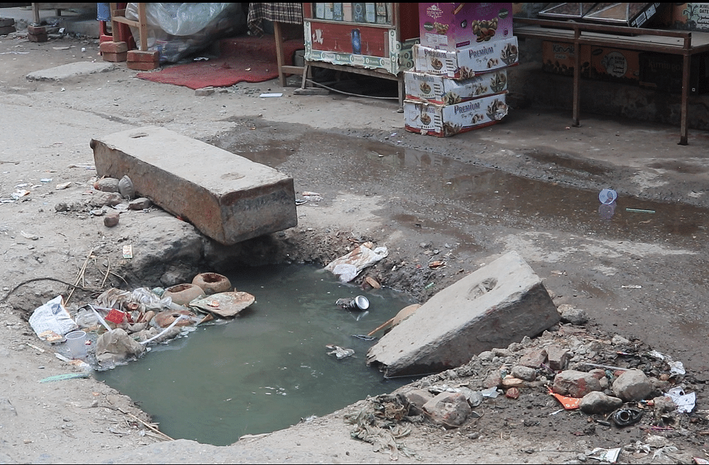 One has to be extremely careful while using the road as there are over five manholes, either open or broken.