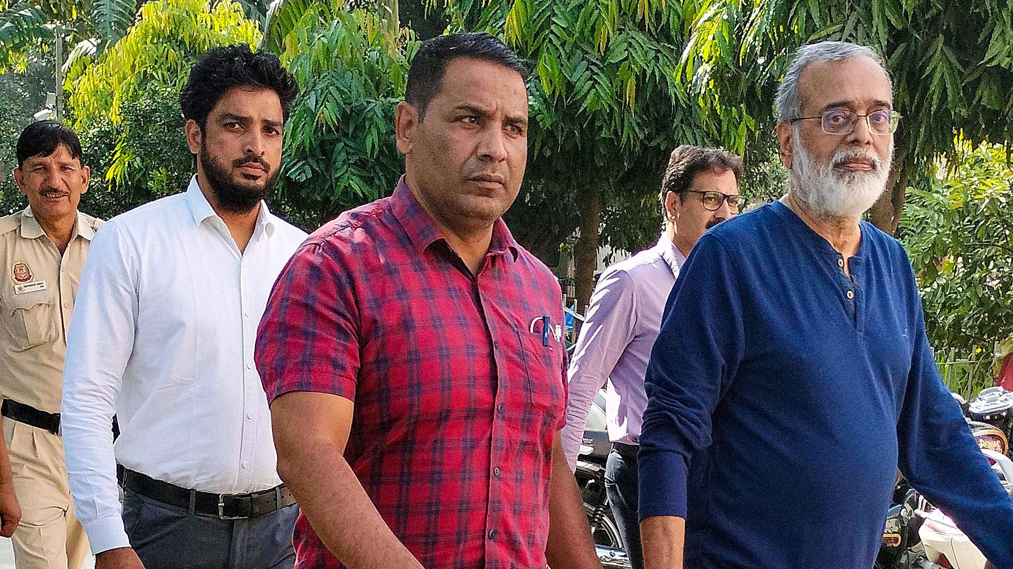 <div class="paragraphs"><p>NewsClick founder Prabir Purkayastha being brought to the Patiala House Court by Delhi Police's Special Cell on Tuesday, 10 October, in a case lodged under anti-terror law UAPA.</p></div>