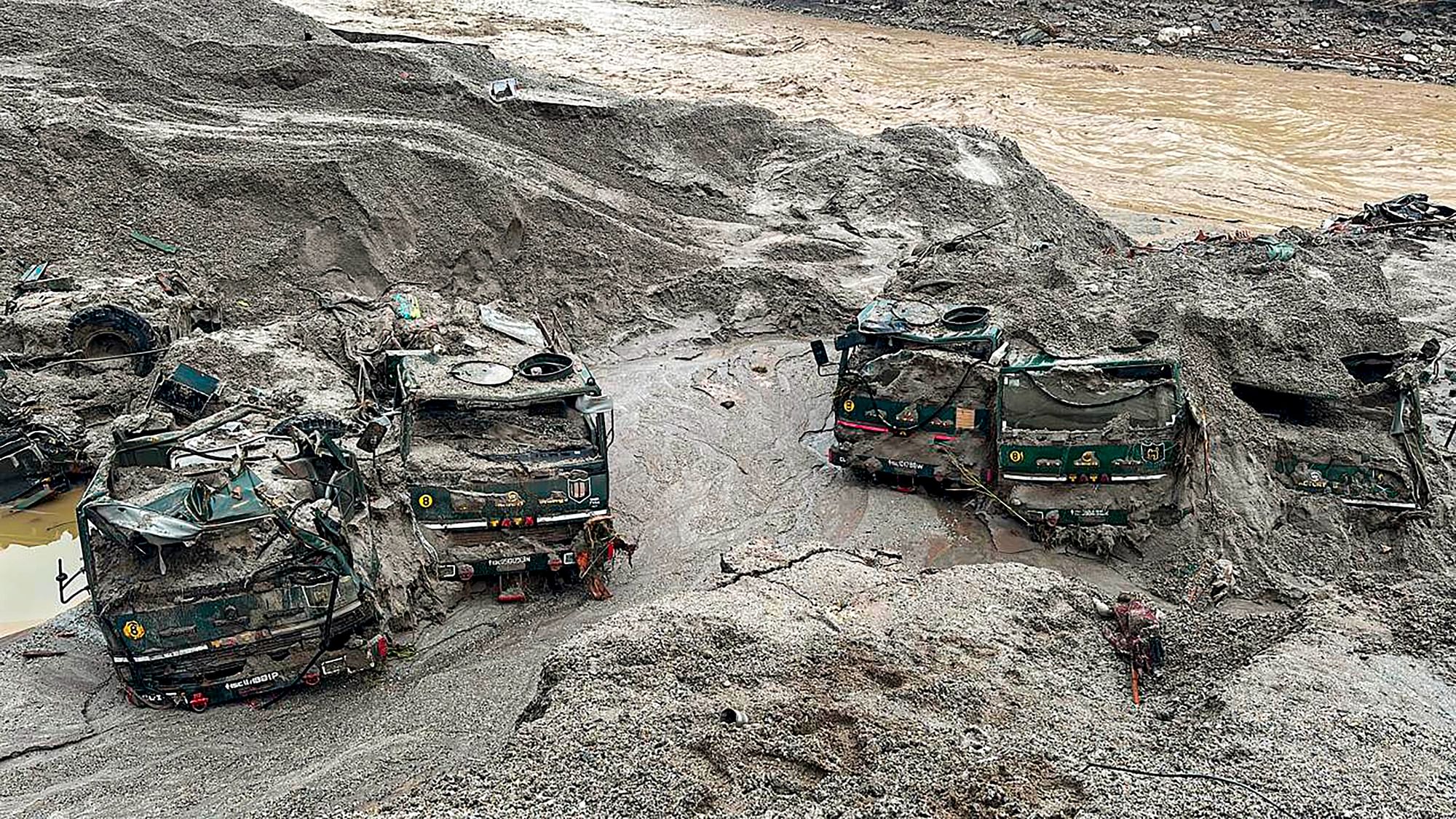 <div class="paragraphs"><p>Indian Army vehicles that were swept away in Wednesday's flash floods, in North Sikkim district.</p></div>