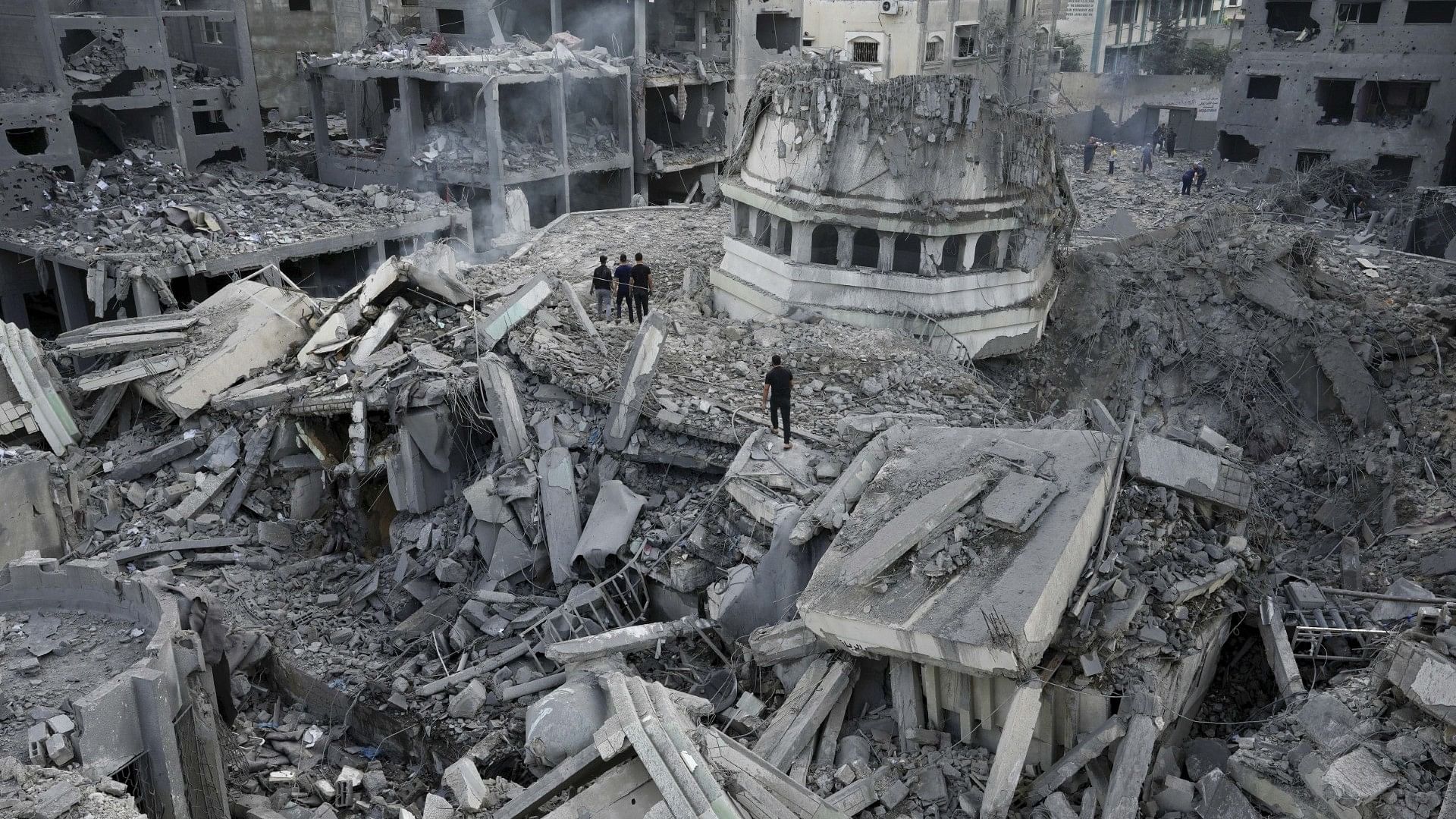 <div class="paragraphs"><p>The rubble of the Yassin Mosque, destroyed in an Israeli airstrike, is seen at Shati refugee camp in Gaza City early Monday, 9 Oct 2023. Israel's military battled to drive Hamas fighters out of southern towns and seal its borders Monday as it pounded the Gaza Strip</p></div>