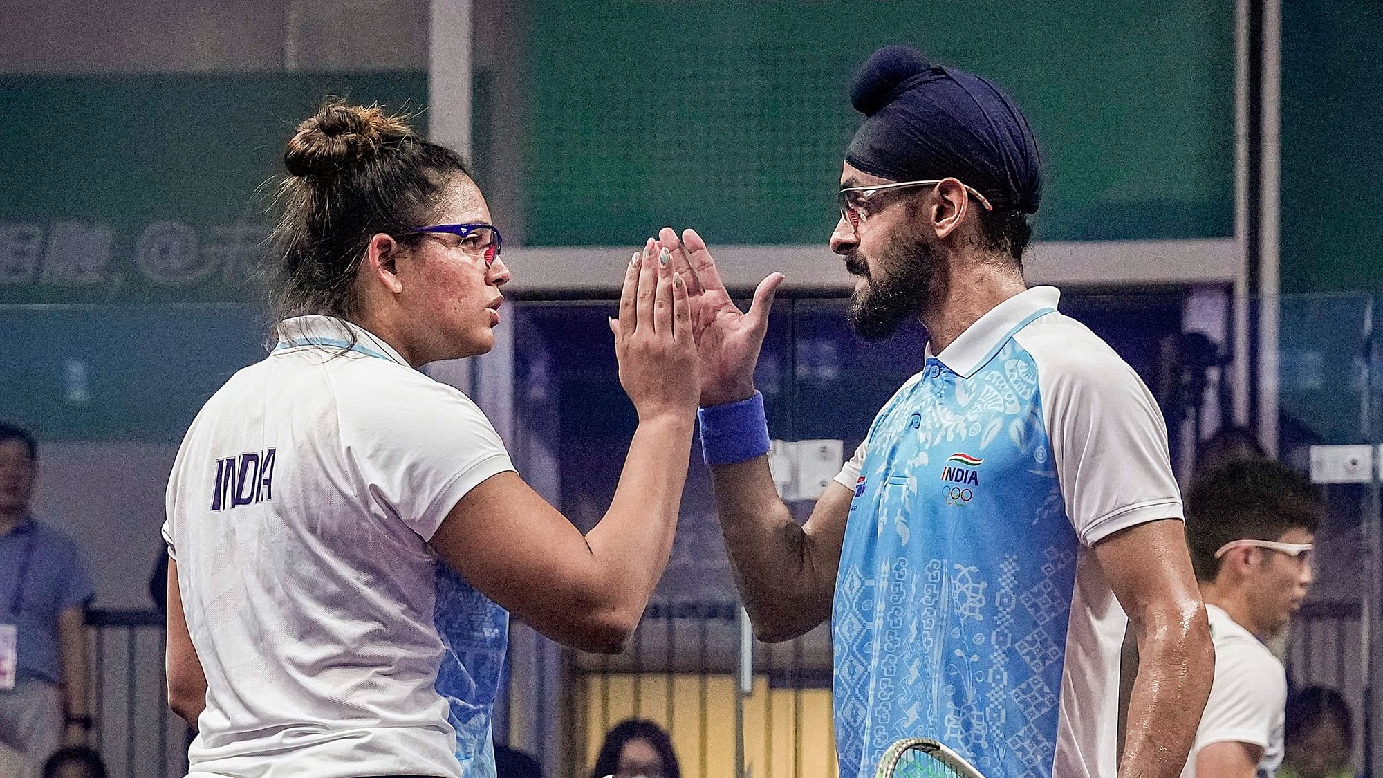 <div class="paragraphs"><p>Hangzhou: India’s Harinder Pal Singh Sandhu and Dipika Pallikal celebrate a point against Hong Kong's Ka Yi Lee and Chi Him Wong during mixed doubles squash semifinal match at the 19th Asian Games, in Hangzhou, China, Wednesday, Oct. 4, 2023.</p></div>