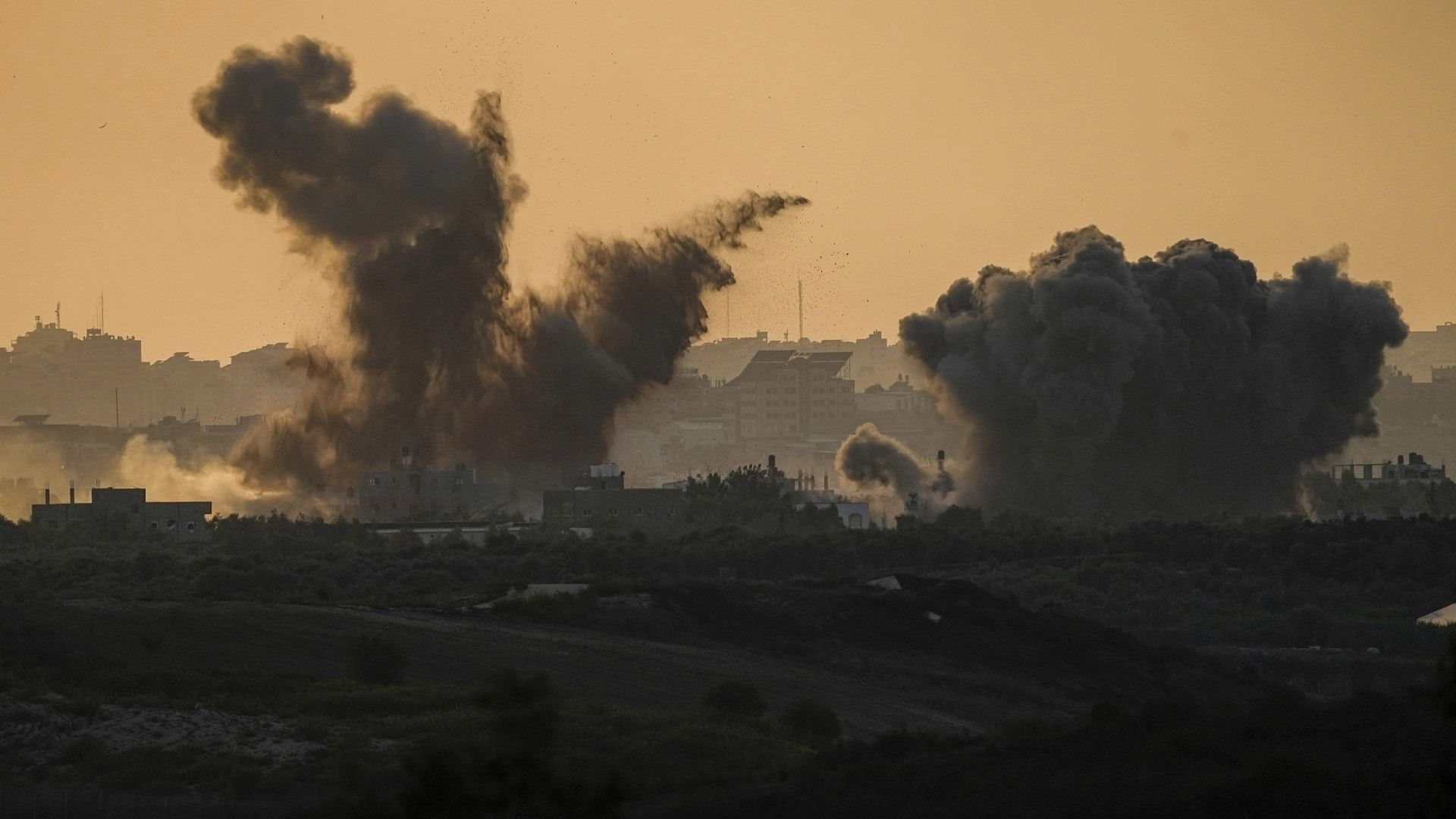 <div class="paragraphs"><p>Smoke rises following an Israeli airstrike in the Gaza Strip, as seen from southern Israel.</p></div>