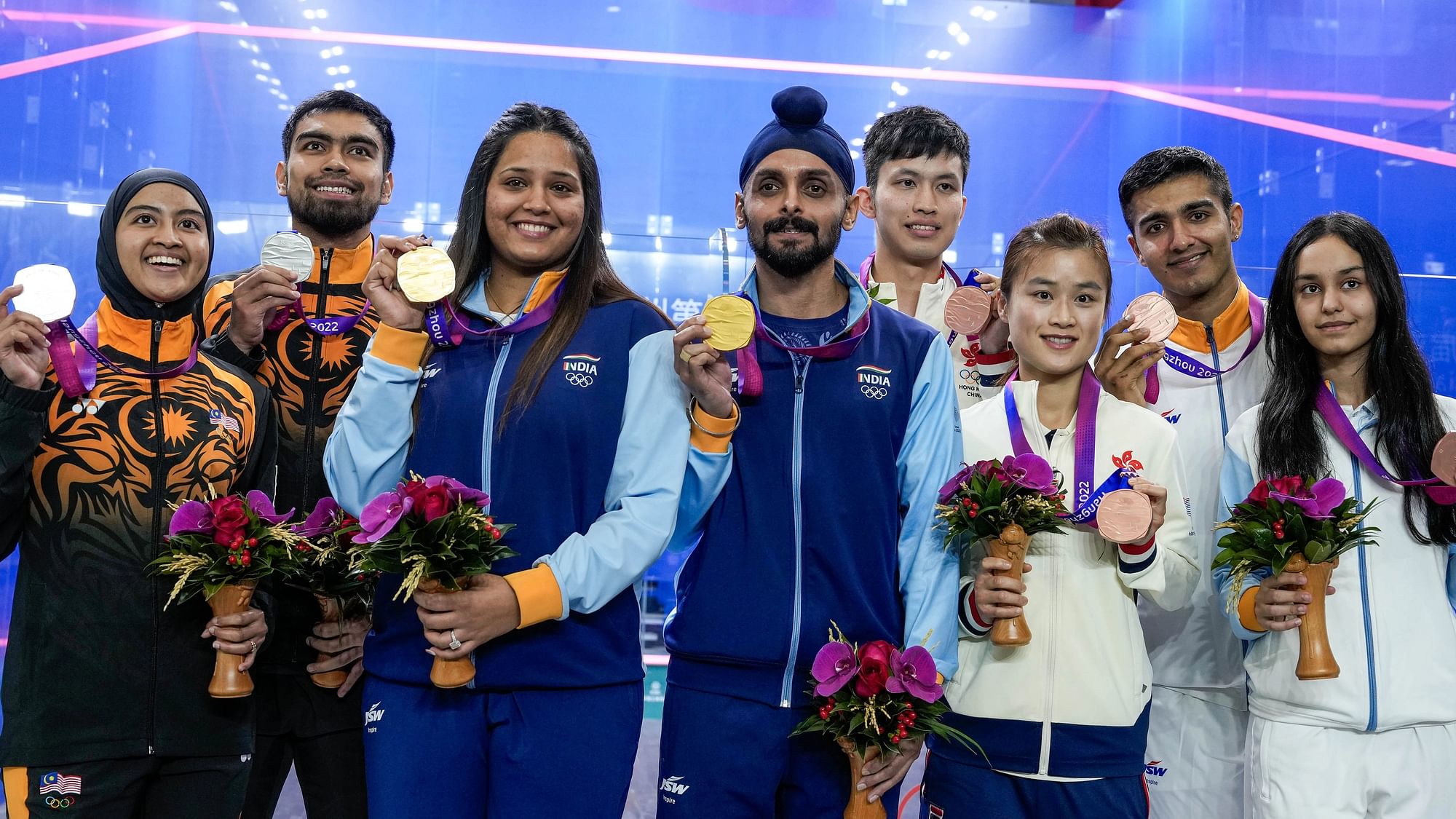 <div class="paragraphs"><p>Hangzhou: Dipika Pallikal and Harinder Sandhu with their gold medal won in the  Mixed Doubles squash event at the 19th Asian Games, in Hangzhou, China, Thursday, Oct. 5, 2023.</p></div>