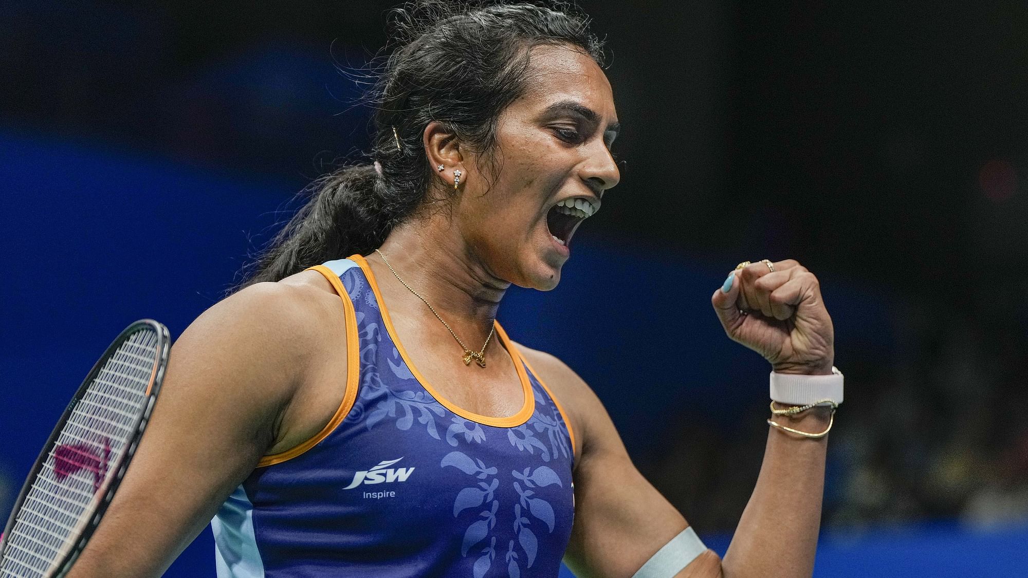 <div class="paragraphs"><p>India's PV Sindhu reacts after winning a point against Wen-Chi Hsu of Chinese Taipei during their womens singles badminton match at the 19th Asian Games, in Hangzhou, China, Tuesday, Oct. 3, 2023.</p></div>